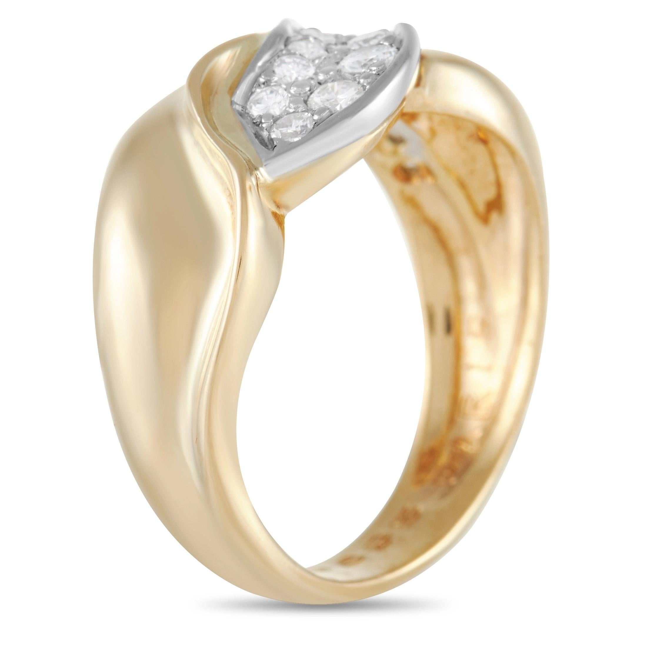 Instantly enhance your luxury and sophistication with this exceptional Chaumet cocktail ring. A piece that will always command attention, it features a gracefully curved 18K Yellow Gold band that measures 5mm wide. At the center, an array of