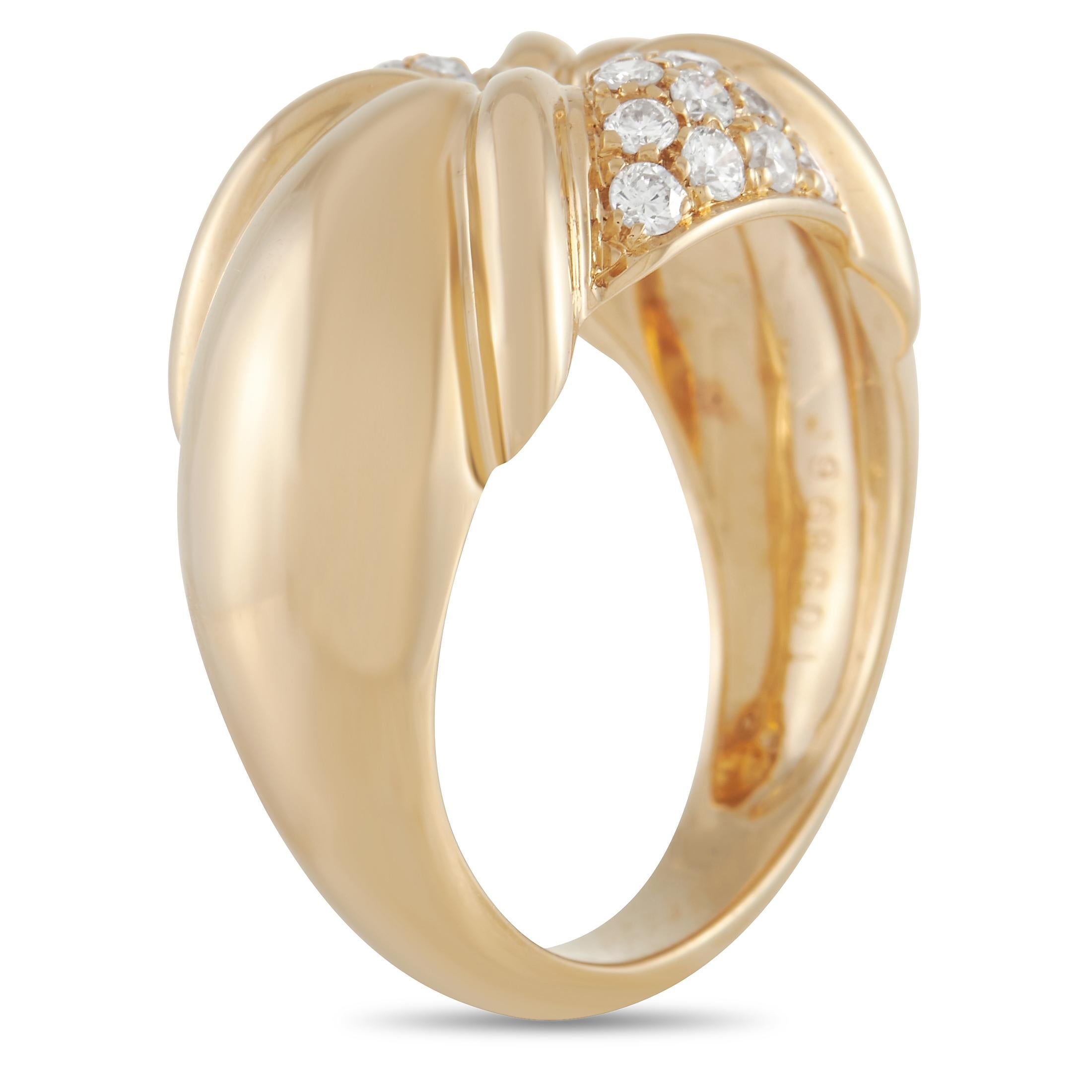 Take your jewelry collection to a surprising new level with the help of this exquisite 18K Yellow Gold ring from Chaumet. Gentle ridges and negative space at the center of this design make it undeniably stunning. With both a band width and top