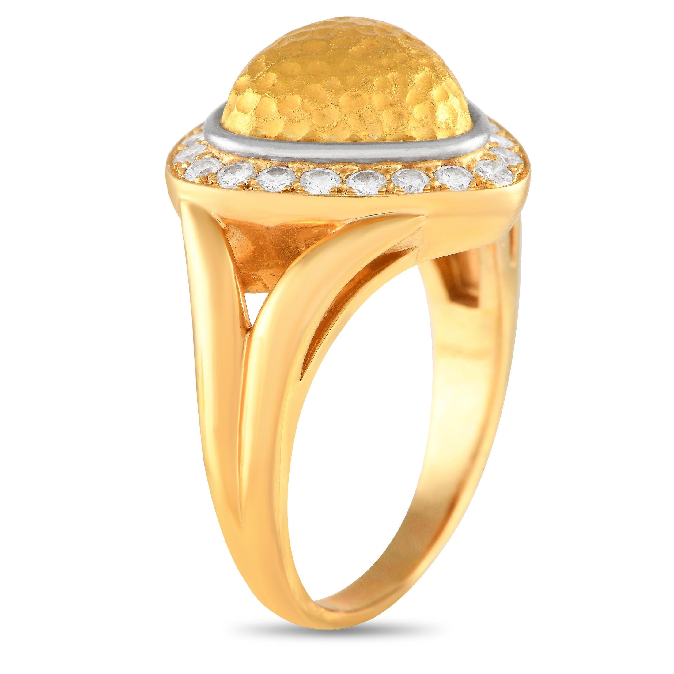 From Maison Chaumet, here is an 18K yellow gold ring with undeniable retro charm. This cocktail ring has a curvy split shank topped with a domed, rounded triangle gold nugget with a hammered finish. The textured centerpiece is surrounded by a halo