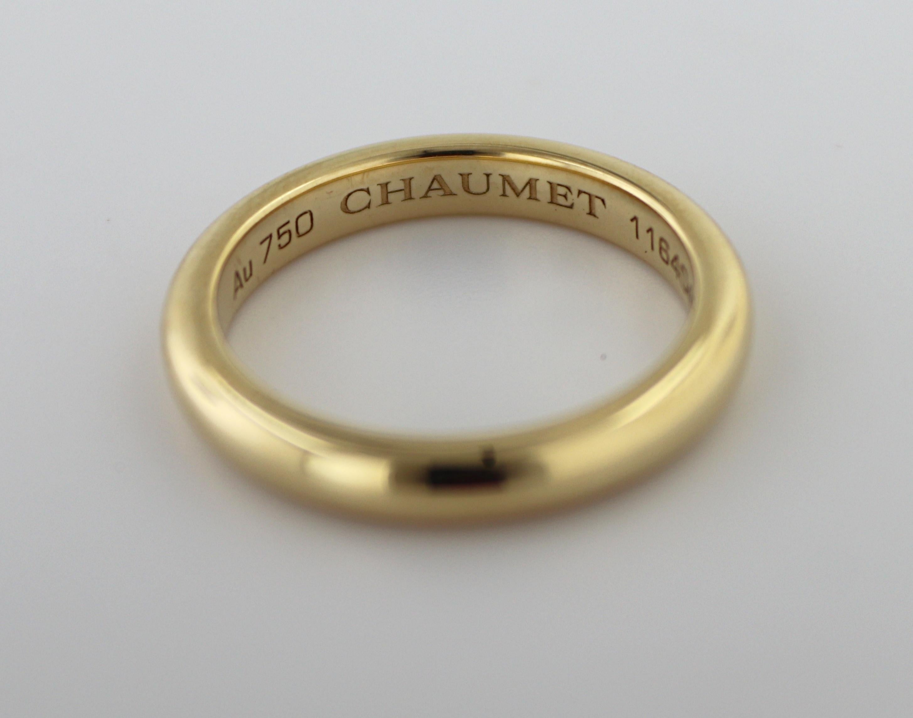 The 2.8 mm, 18k yellow gold half round band, size 5.75, Weight 4.73 grams.