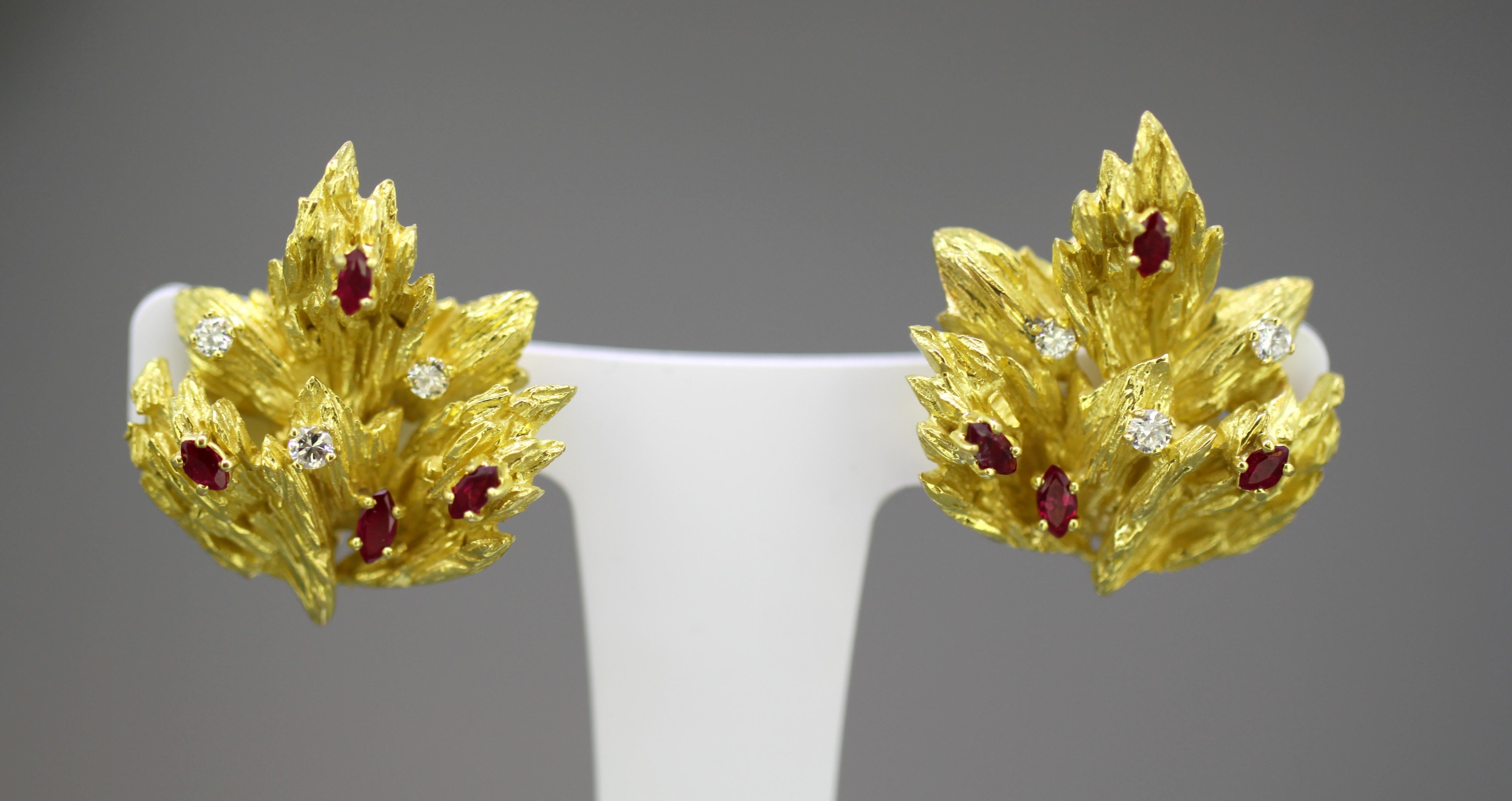 Chaumet 18k yellow gold ladies clip-on earrings with natural rubies and diamonds.
Designer: Chaumet
Made in France Circa 1990's
Fully hallmarked.

Dimensions - 
Size : 3 x 2.8 x 1.6 cm
Weight : 31 grams

Diamonds - 
Cut : round
Number of diamonds :