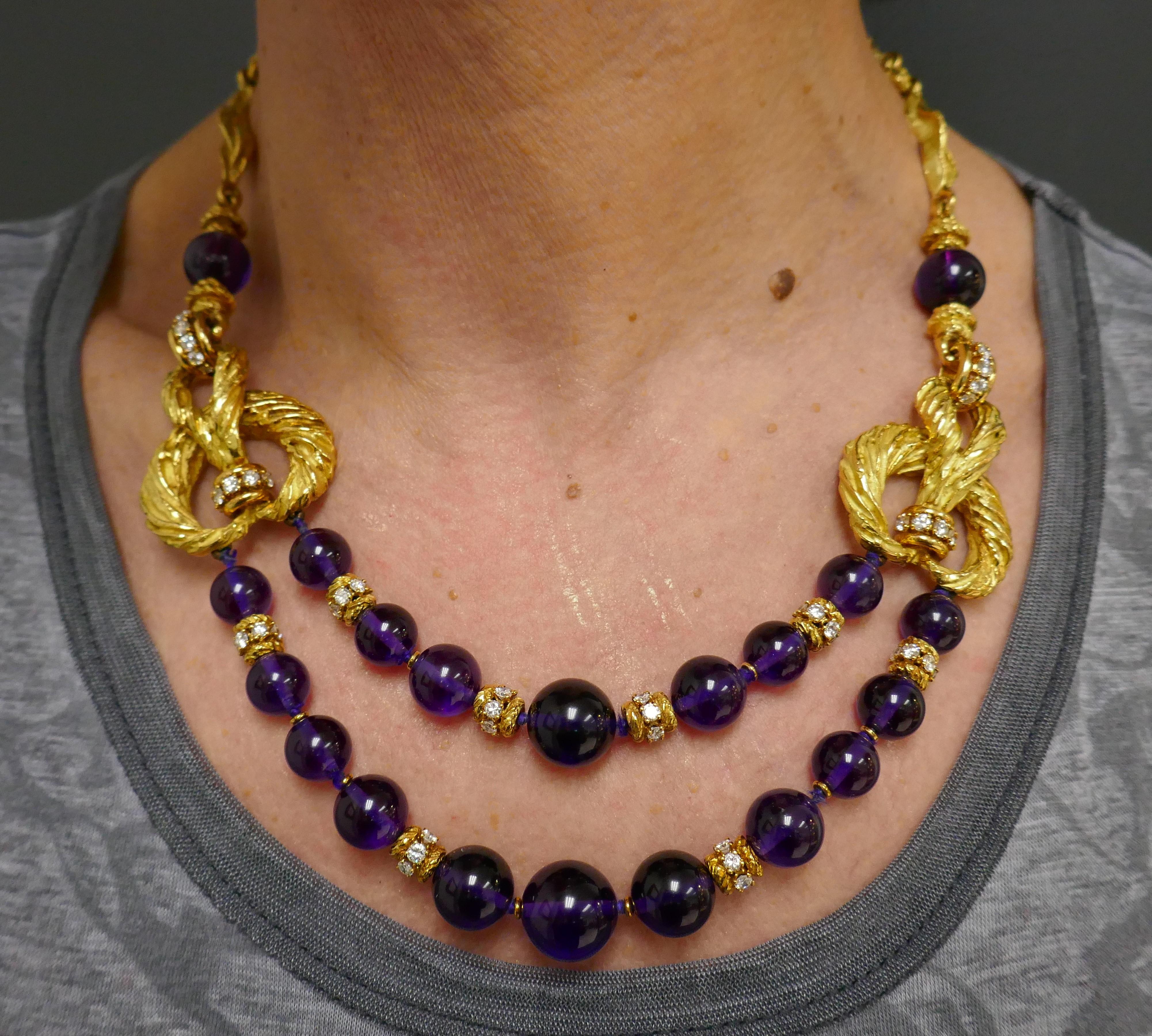 A spectacular vintage set by Chaumet, made of 18k gold, featuring amethyst and diamond. The set consists of a beaded necklace and a pair of earrings. 
The necklace has an intricate design that includes textured gold elements, diamond rondelles, and