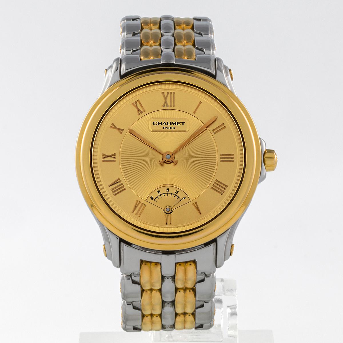 This is a neo-vintage piece from the 1990s, a stylistic trend that takes elements from vintage styles (usually from the 1950s to the 1980s) and updates or adapts them for a contemporary audience. A Chaumet aquila with with power reserve indicator