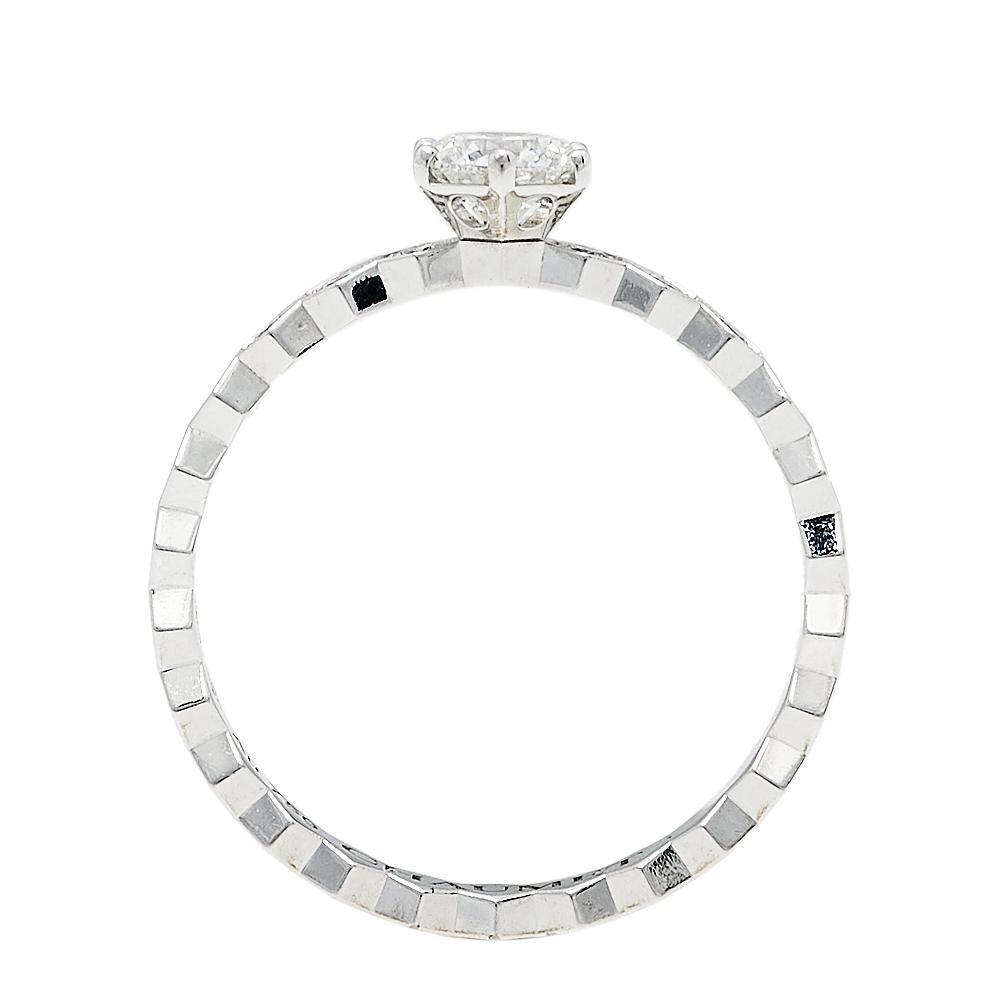 A symbol of femininity by Chaumet in the form of this precious ring from the Bee My Love collection. Formed using 18k white gold, the ring has a unique geometric shape mimicking the honeycomb. A large brilliant-cut diamond is heralded beautifully