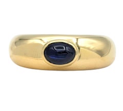 Chaumet Bezel Set Cabochon Blue Sapphire Dome Band Ring in 18 Karat Yellow Gold