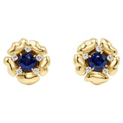 Chaumet Boucles d
oreilles clipsées Fleur de cœur en spinelle bleue et diamant