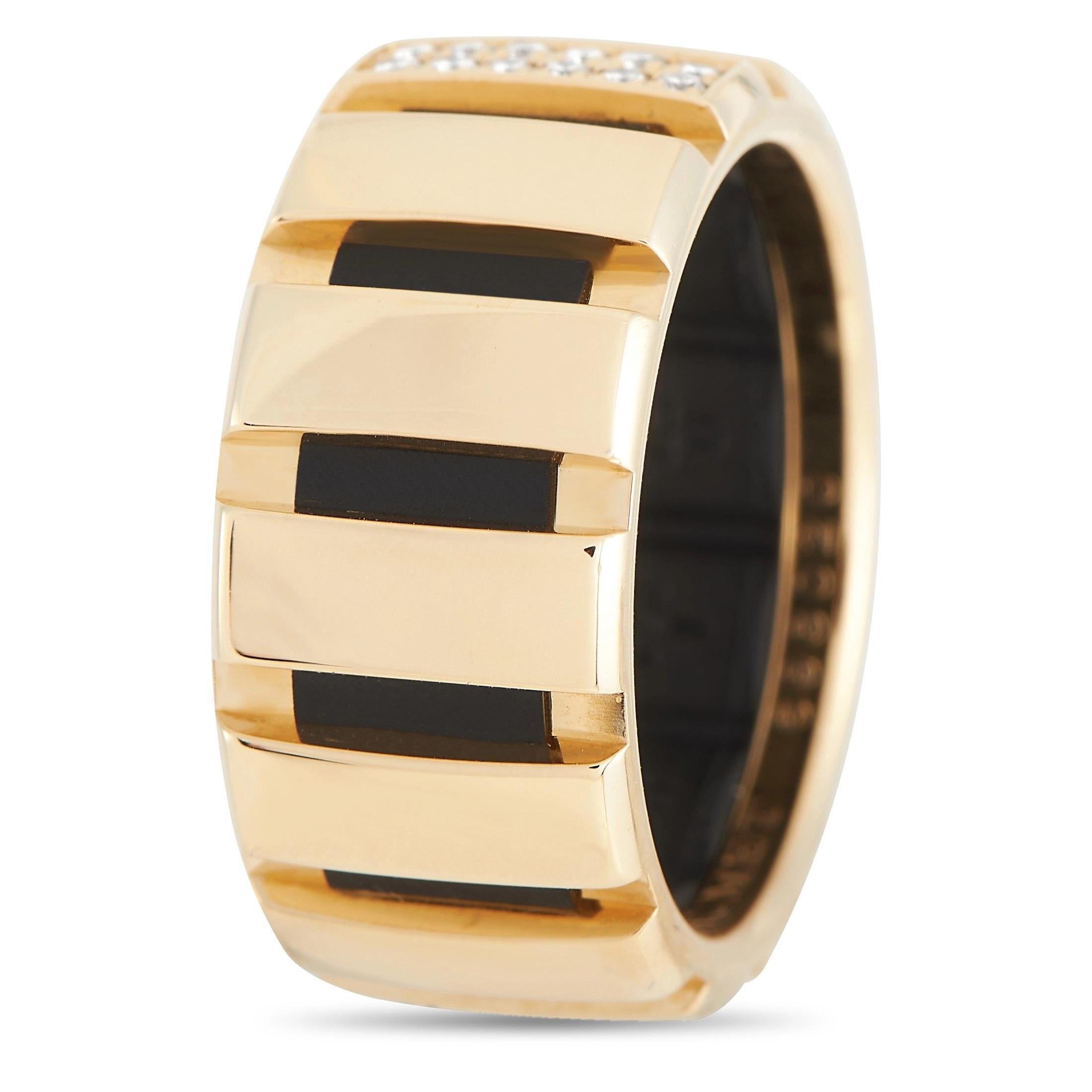 This Chaumet Class One band ring will continually command attention. The geometric design measures 10mm wide and features a luxurious 18K Yellow Gold setting. A double row of round-cut diamonds adds a touch of sparkle and shine. 
 
 This jewelry