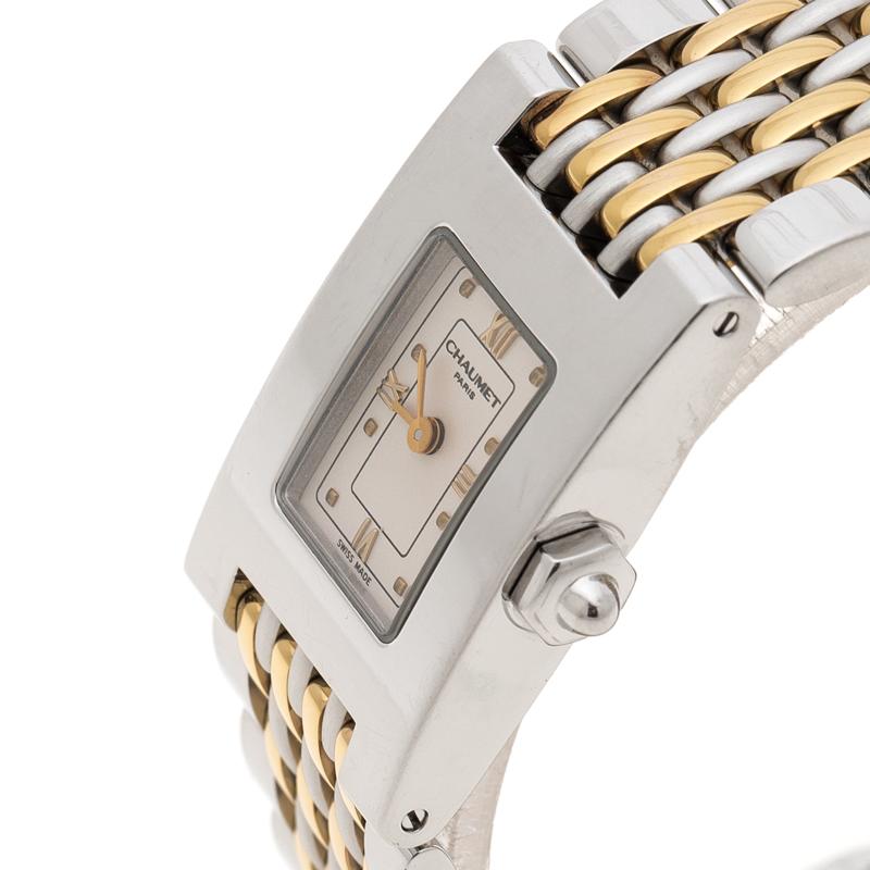 Exuding grace and beauty, this Chaumet is crafted to perfection from stainless steel. Its case holds a broad silver-tone bezel giving it a bold look and a plain white dial highlighting the golden hour markers elegantly. Featuring an automatic