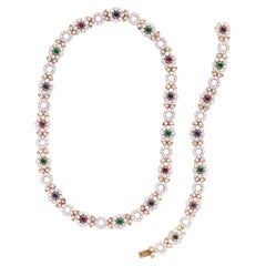 Chaumet Diamond, Emerald, Ruby, Sapphire, 18K Gold Demi-Parure, c. 1980