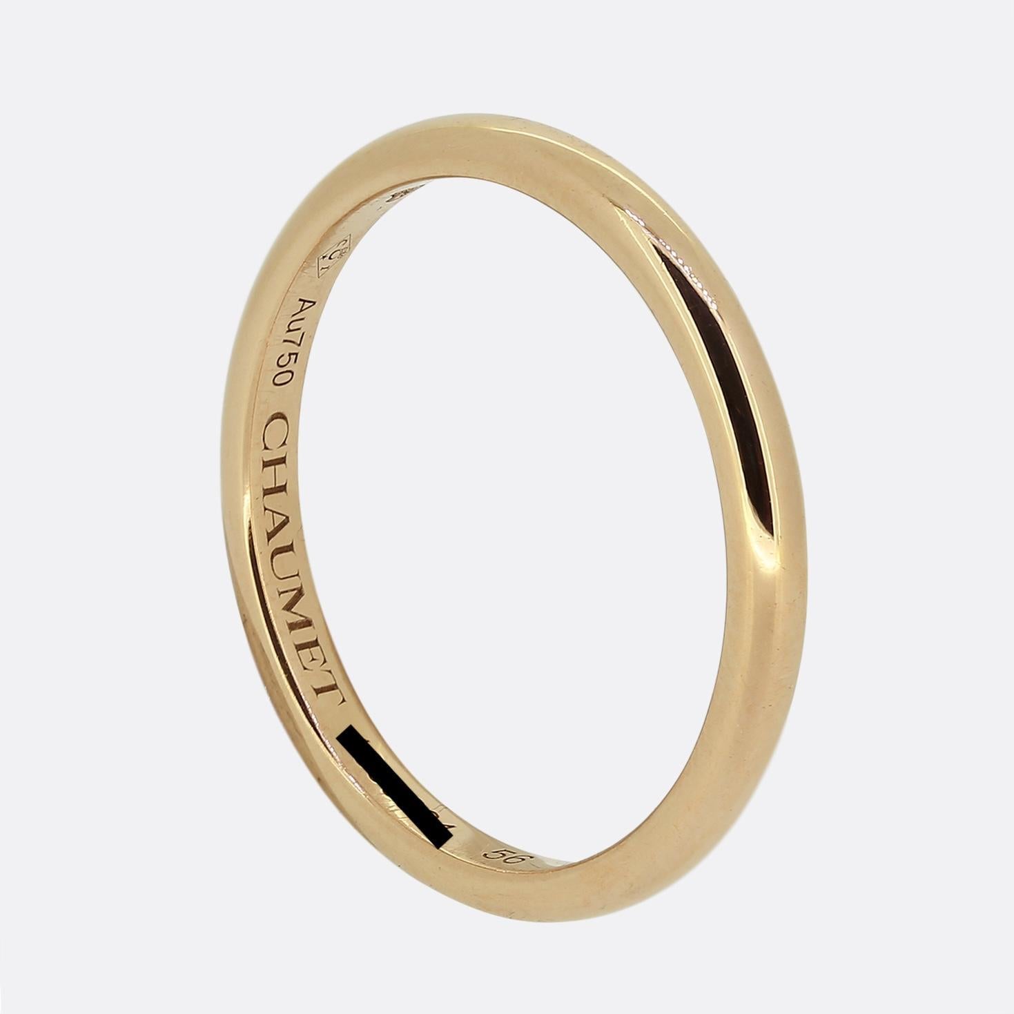 Here we have an 18ct rose gold band ring by Chaumet. The piece features a sleek, polished design with a smooth, rounded surface. The interior is engraved with the brand name and set with single tiny round brilliant cut diamond. 

Condition: Used