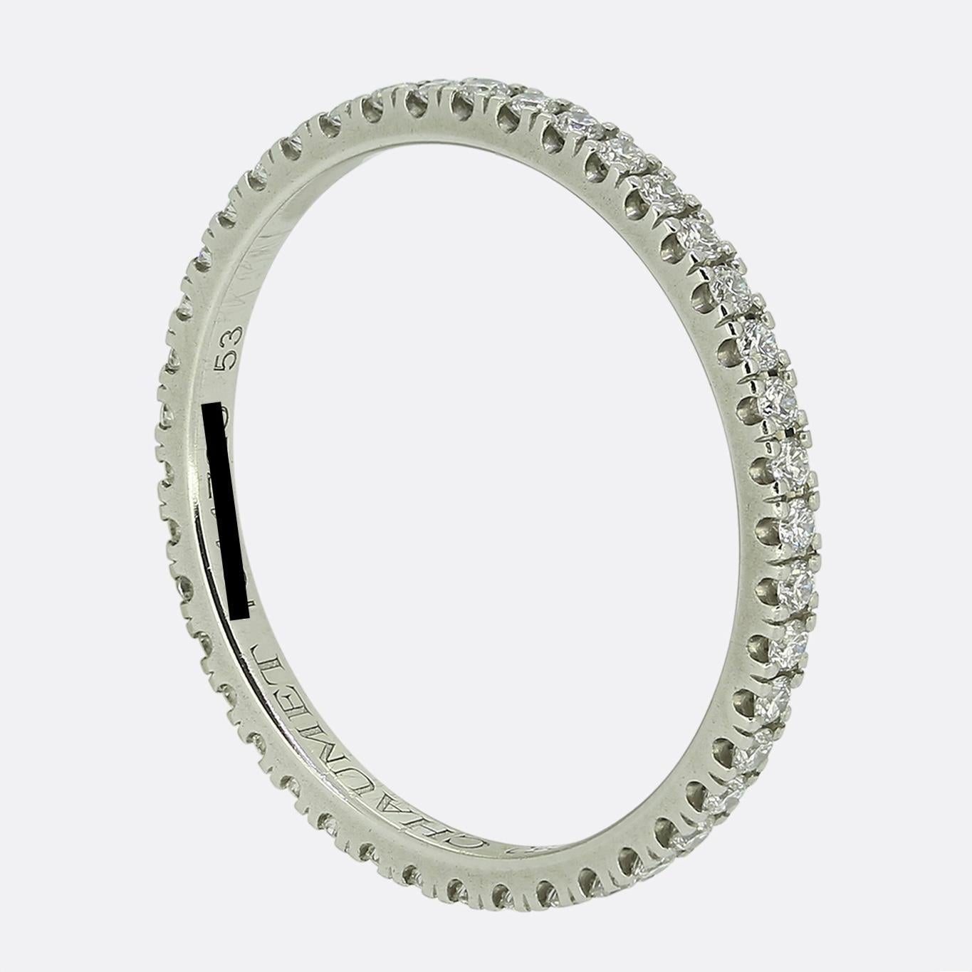 Here we have a modern platinum diamond eternity ring by Chaumet. The ring features a continuous row of brilliant-cut white diamonds, each of which has been meticulously claw set in a sleek, narrow band.

Condition: Used (Very Good)
Weight: 1.8