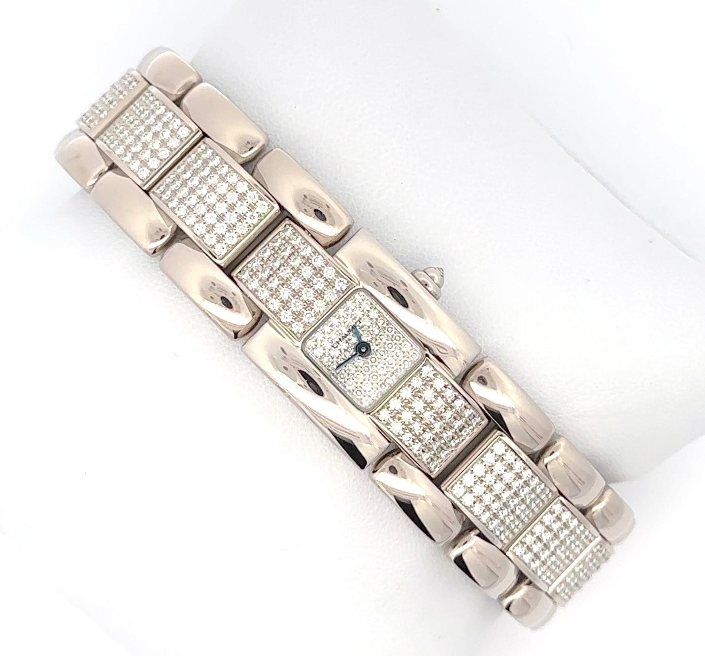 This is a gorgeous, rare and nearly irreplaceable all original Chaumet Diamond watch. The diamond quality is excellent, consisting of 9 carats of colorless, VS+ diamonds. The diamonds are pavé set. The surrounding metal is 18K White Gold with a