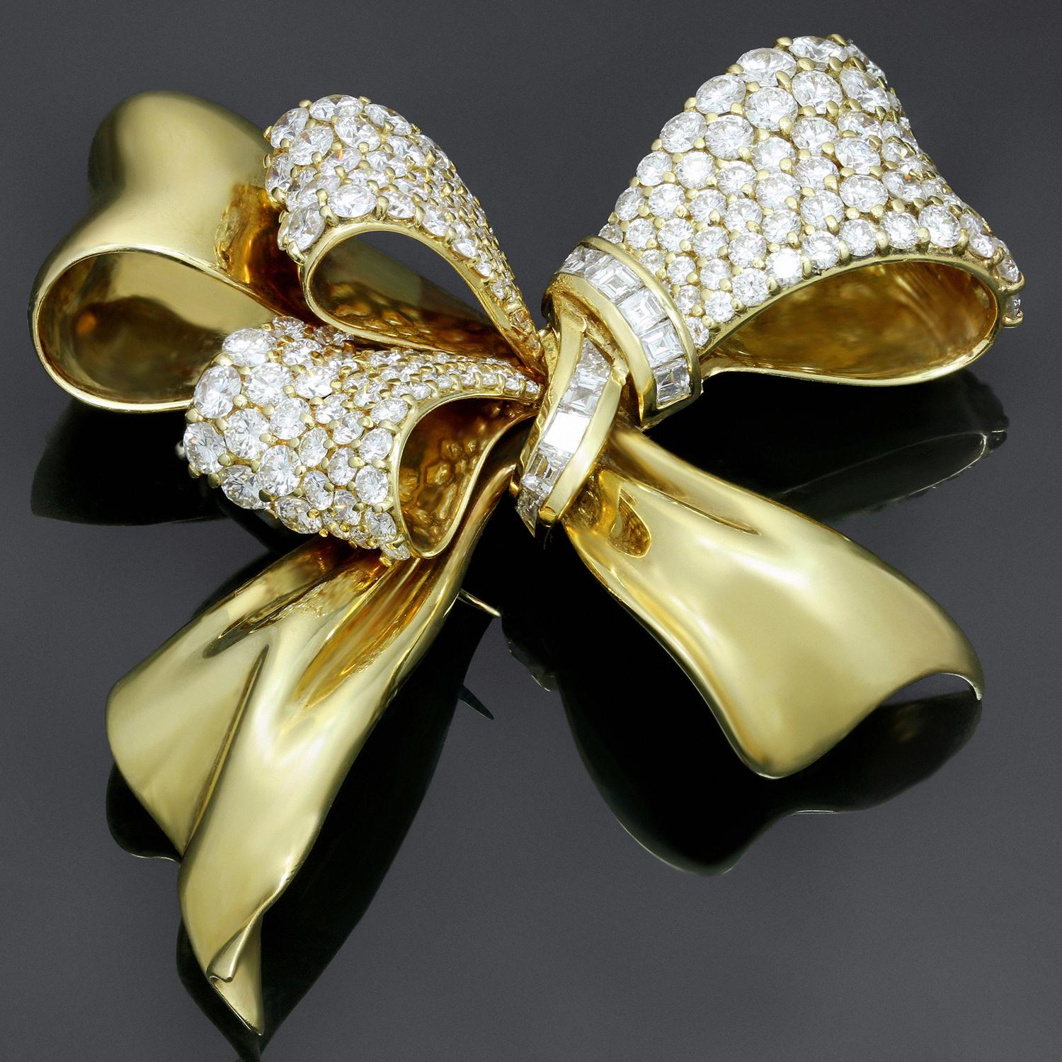 From Chaumet comes this delightful diamond and 18k yellow gold brooch. Estimated  diamonds total carat weight 10.5ct - 11.5 ct.  Pin this cheerful beauty on your lapel today! 
Width - 2.16