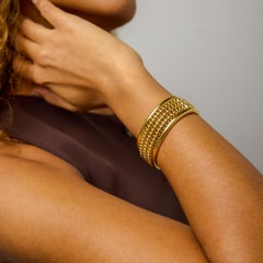 Chaumet French 18k yellow gold Abacus bangle