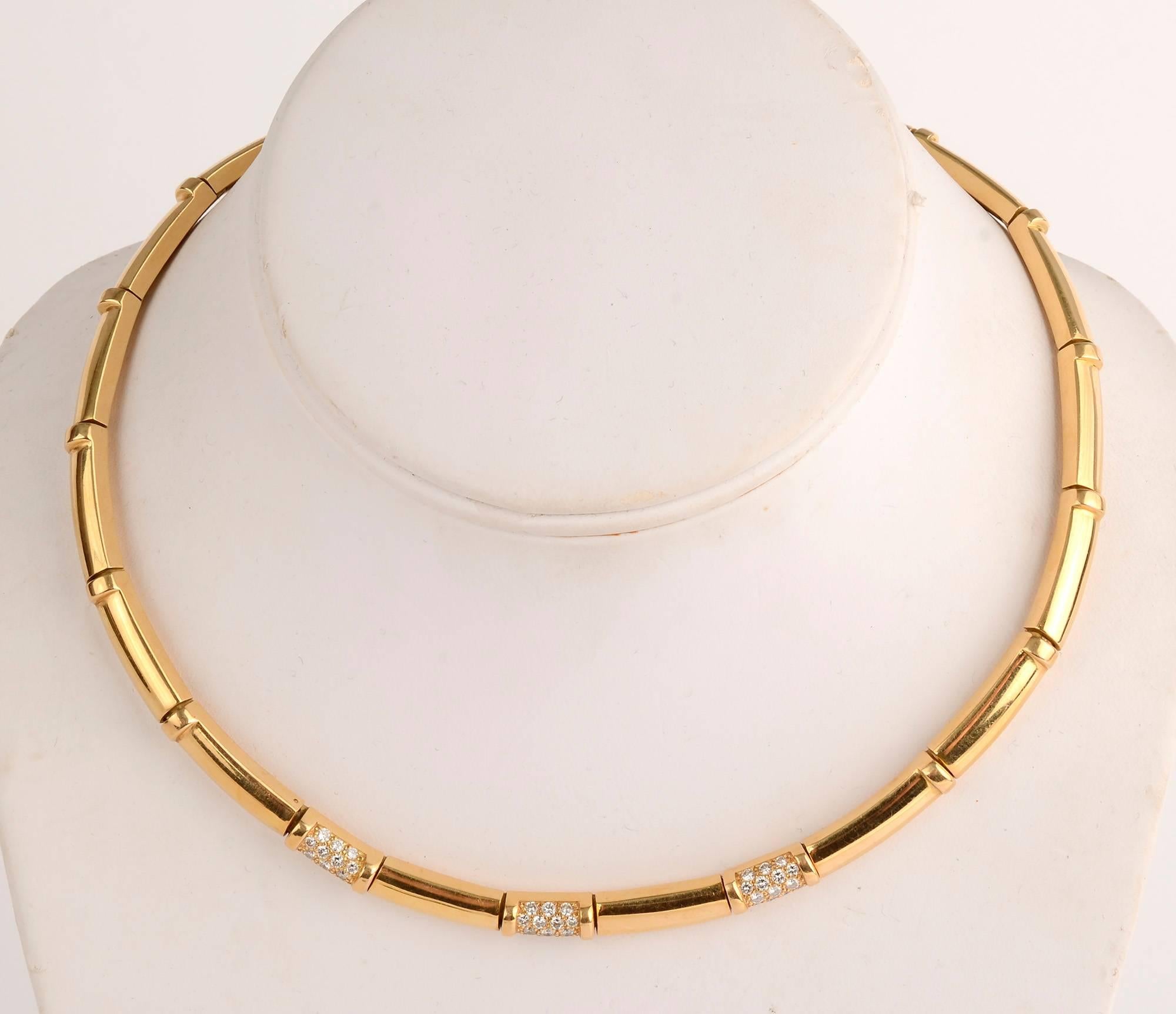Elegant choker necklace by Chaumet with three panels of diamonds. The 42 diamonds weigh approximately 1 carat and are G color, VS quality. The necklace is made if 3/4 inch gold panels making it very flexible and comfortable to wear. Length is