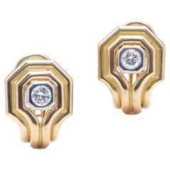 Chaumet ladies 18kt yellow gold clip-on earrings set with stunning diamonds. 