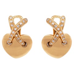Orecchini a clip Chaumet Liens con diamante e oro giallo 18 carati con cuore e bacio