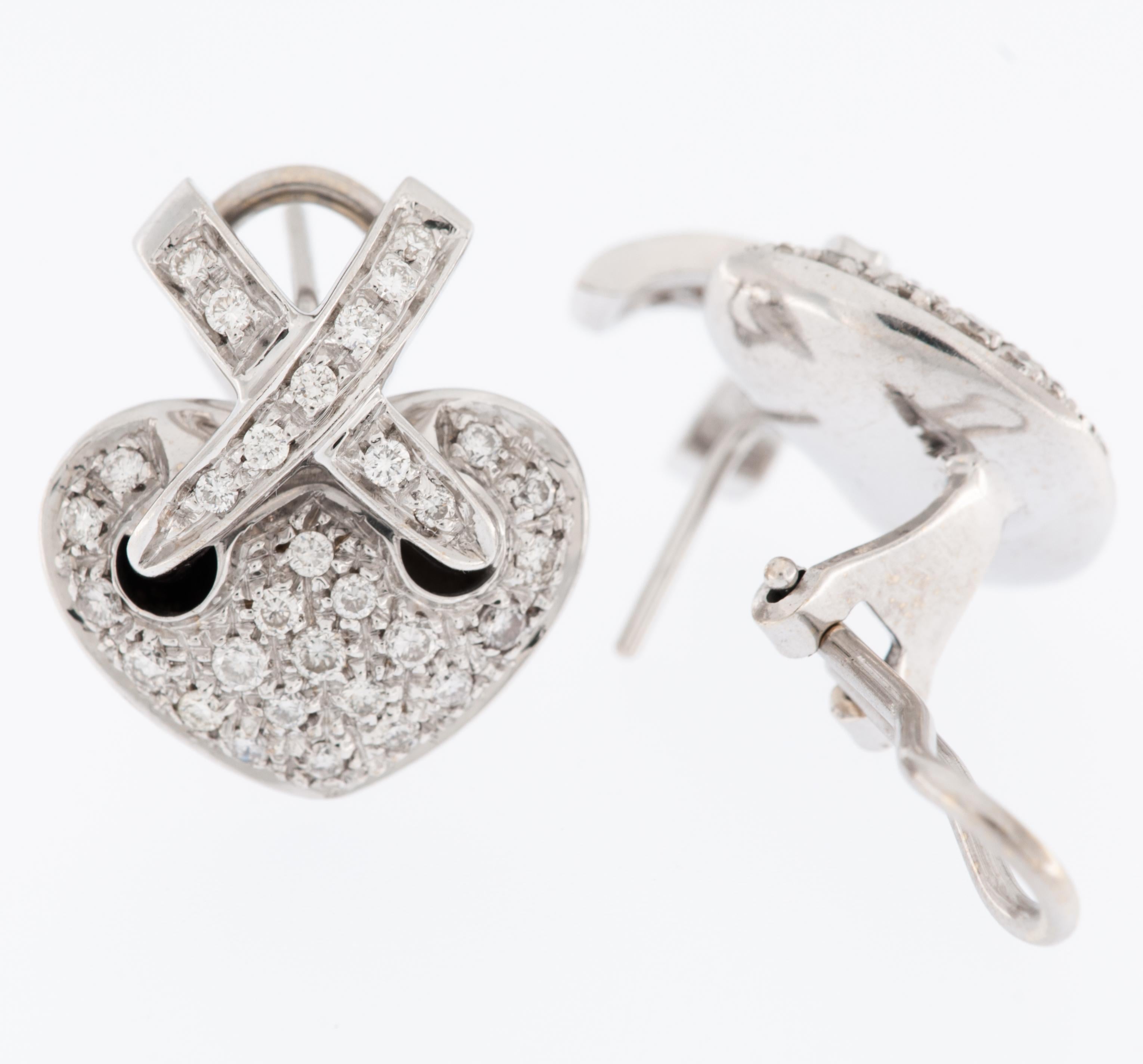 The Chaumet Liens Style 18kt White Gold Heart Earrings with Diamonds are a stunning example of fine jewelry that combines elegance with a touch of romance.

The earrings are made from 18-karat white gold, a choice that imparts a sense of modern