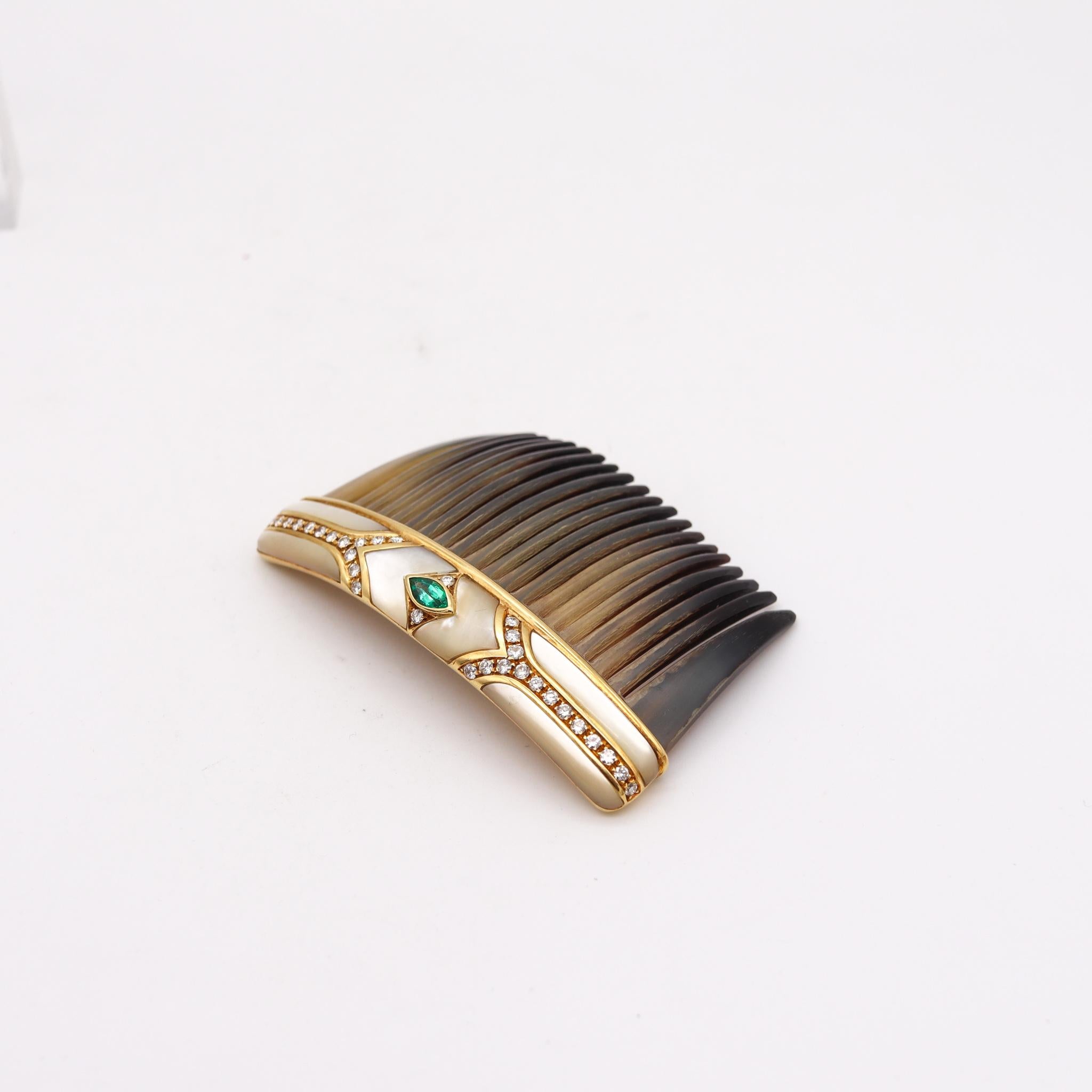 Gems set hair comb designed by Chaumet.

Fabulous and very luxurious gems set hair comb, created in Paris France by the house of Chaumet, back in the 1968. Beautifully mounted in a frame crafted in solid yellow gold of 18 karats with high polished