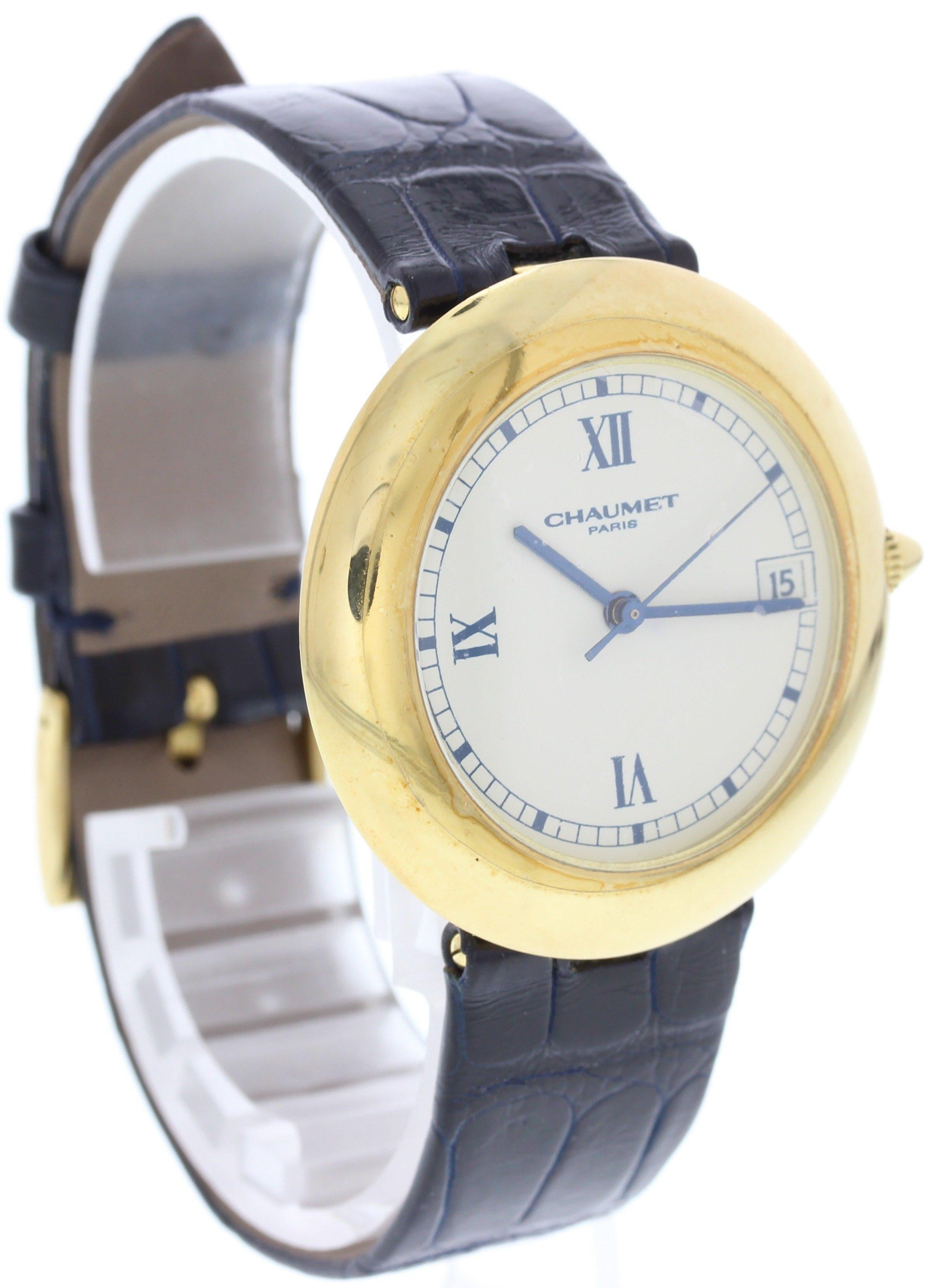 Chaumet 13A-684 watch. 18k Yellow Gold 36mm case with exhibition case back. White dial with date aperture, and Roman Numeral markers. Sapphire crystal. Original Black leather Chaumet band with a Gold buckle strap. Automatic movement. Water