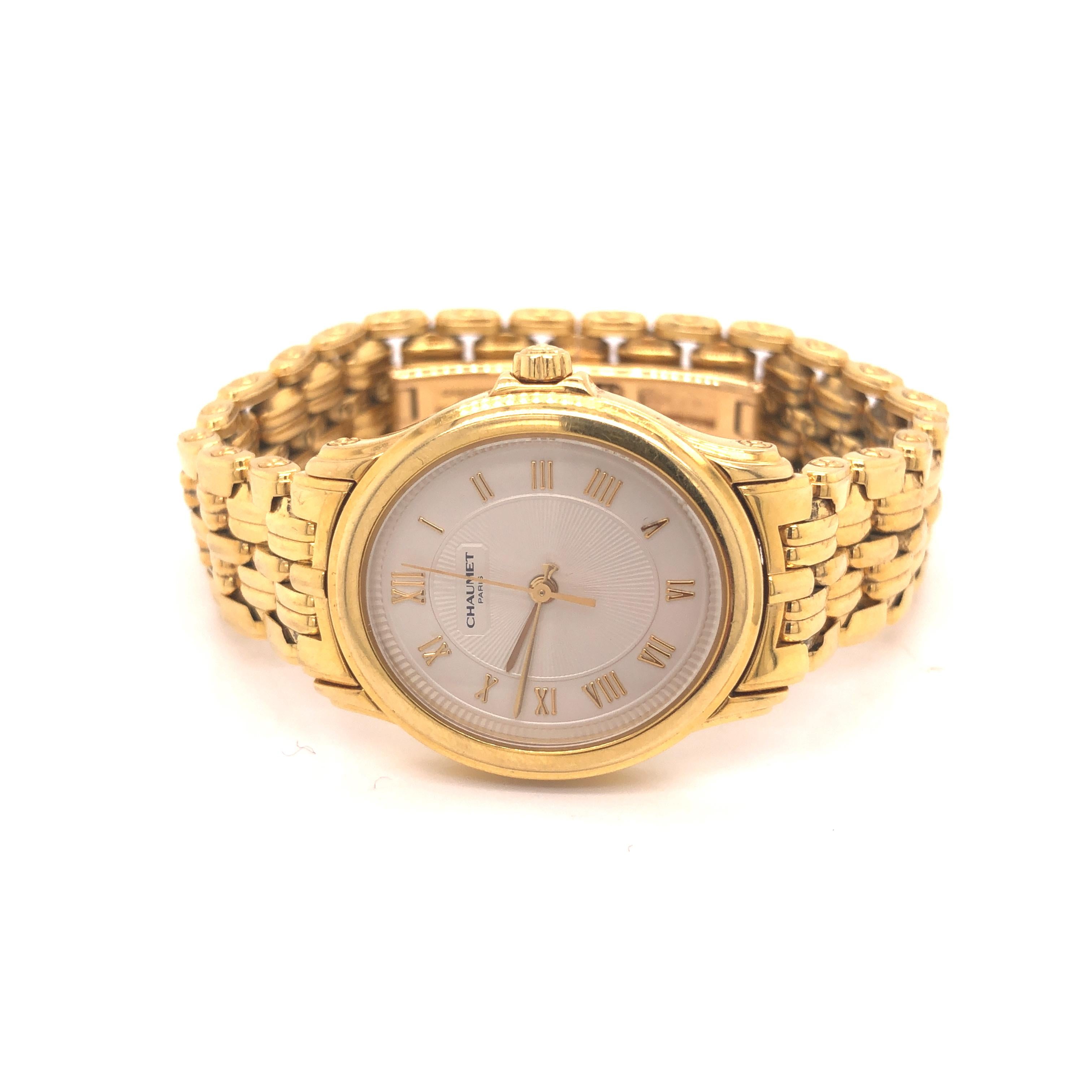 Chaumet Paris 18K Yellow Gold Roman Numerals Ladies Watch. The face of the watch measures 1 1/8