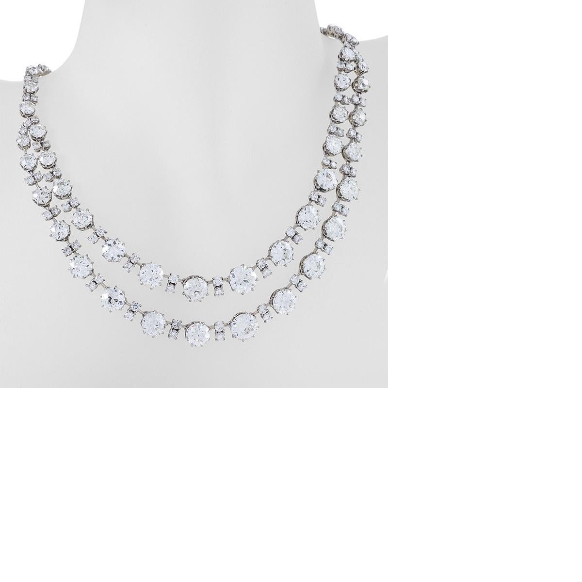 A French Belle Epoque platinum-topped gold necklace with diamonds by Chaumet. The necklace has old European-cut diamonds with an approximate total weight of 68 carats, H-I-J color, VS/SI clarity. The necklace is designed as a graduated double