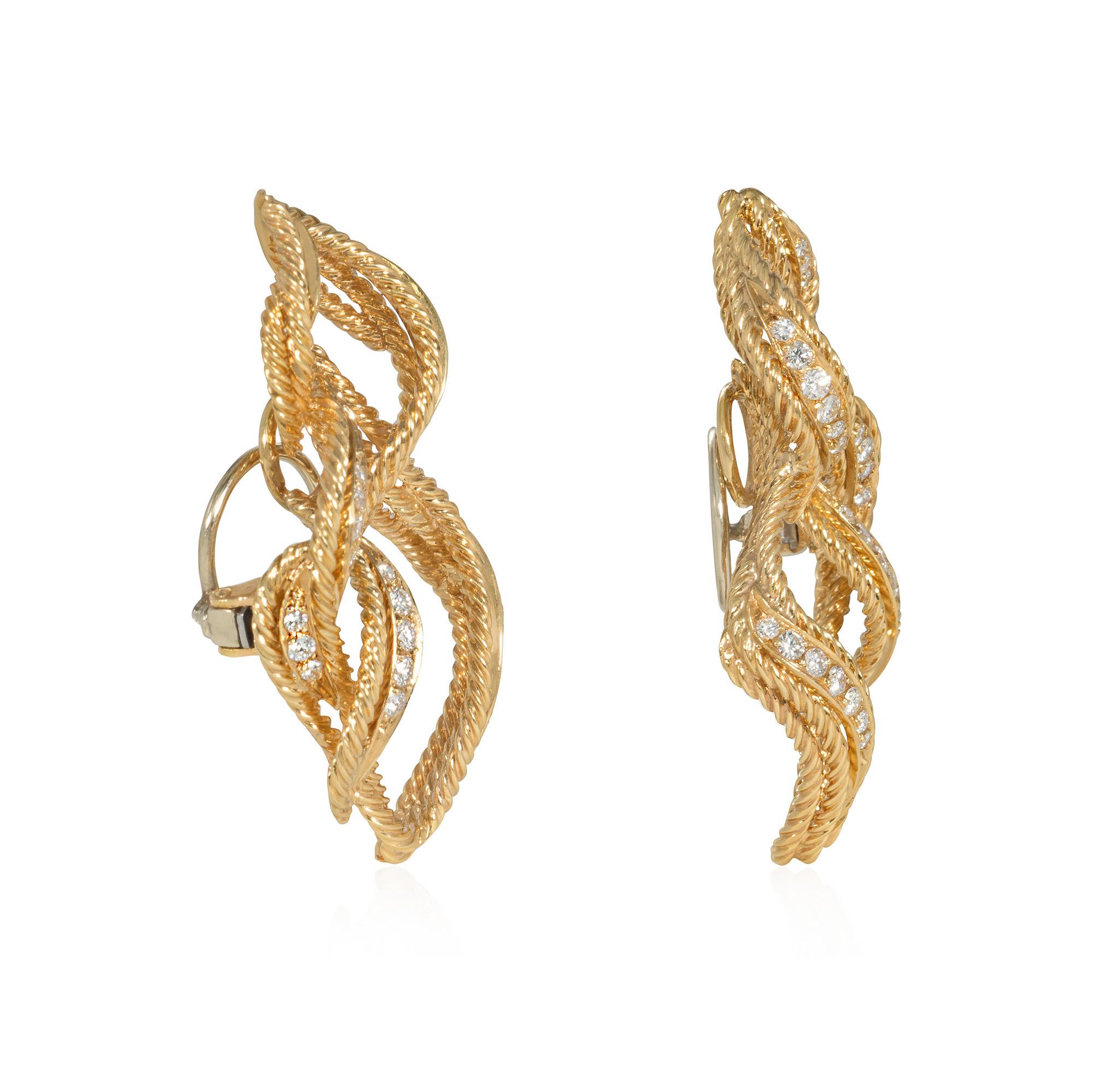 A pair of rope twist gold and diamond earrings designed as open stylized flames, in 18k with clip backs. Chaumet, Paris.  Atw diamonds 1.14 cts.

One of the oldest continuously operating fine jewelry houses, Chaumet was founded in 1780 by
