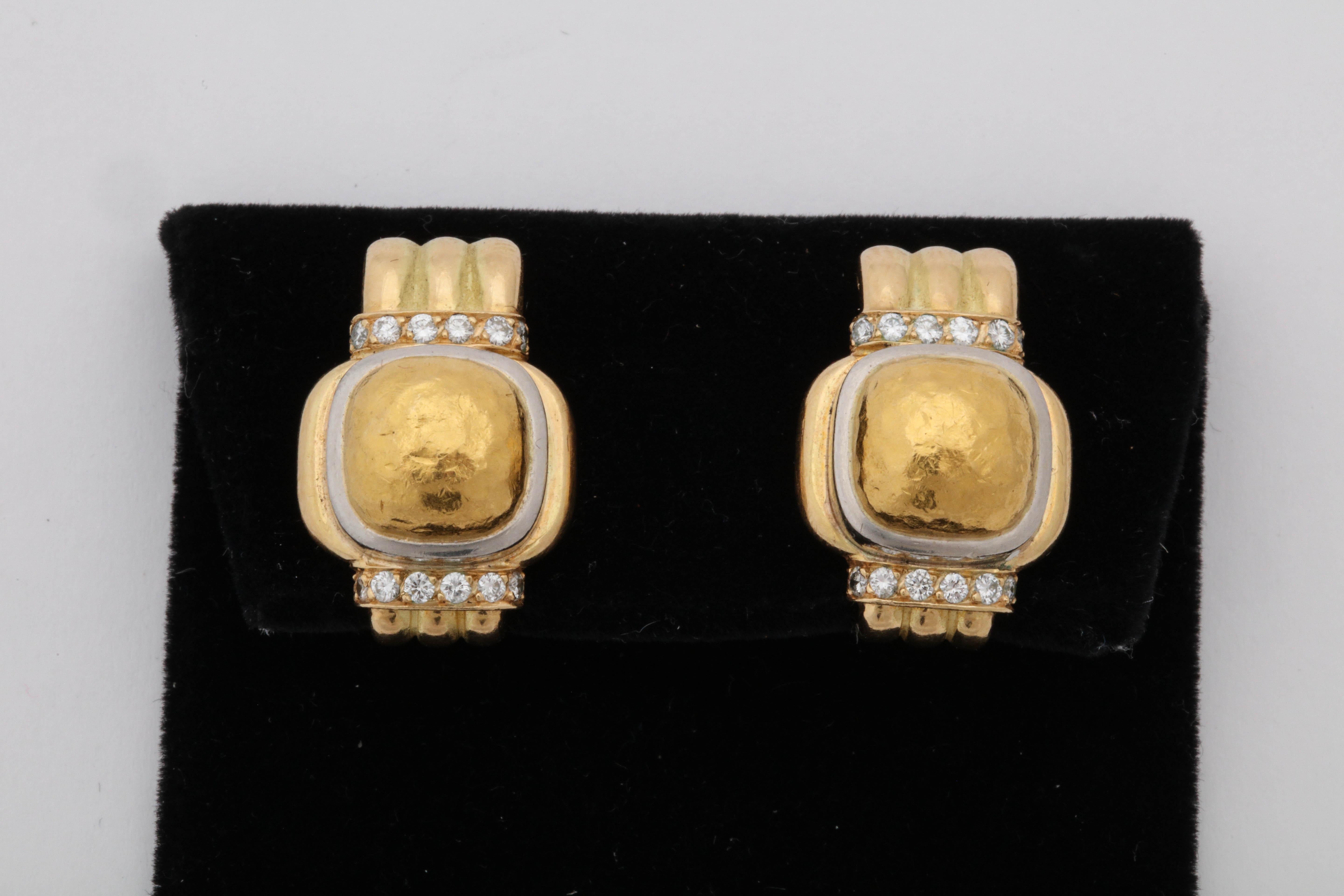 One 18kt Yellow Gold Pair Of Ladies Clip On Earrings With Posts Designed By Chaumet Paris. Center Gold Piece Hand Hammered For A Nugget Style Effect. Earrings Are Also Embellished With [24] Full Cut High Quality Diamonds Weighing Approximately 1