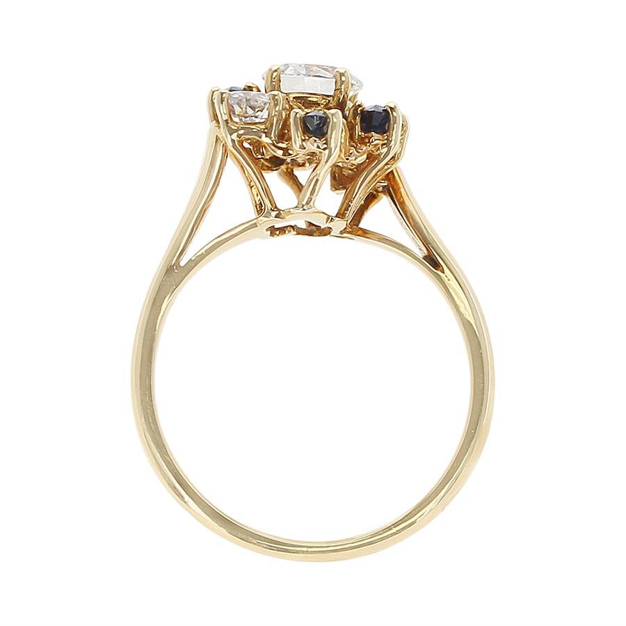Marquise Cut Chaumet, Paris Marquise Sapphire and Round Diamond Ring, 18 Karat Yellow Gold For Sale