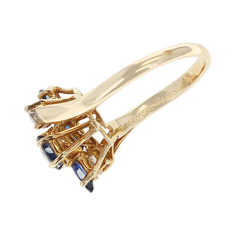 Chaumet, Paris Marquise Sapphire and Round Diamond Ring, 18 Karat Yellow Gold In Excellent Condition For Sale In New York, NY