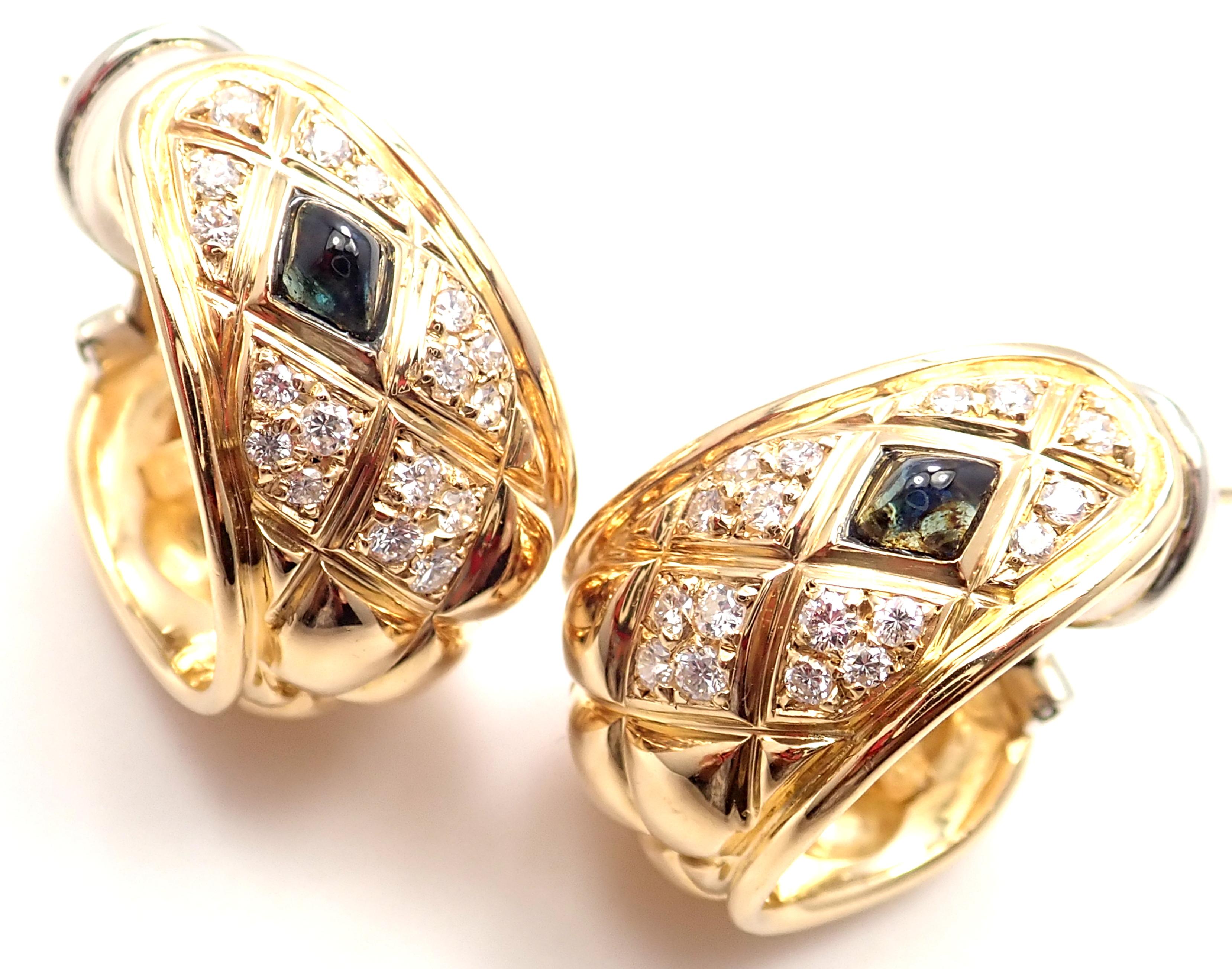 18k Yellow Gold Diamond & Sapphire Quilted Hoop Earrings by Chaumet Paris.
With 34 round brilliant cut diamonds SI1 clarity, G color total weight approx. .75ct
2 cabochon sapphires total weight approx. .50ct
These earrings are made for pierced