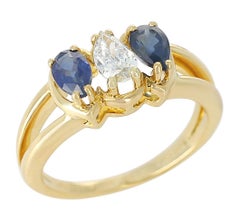 Chaumet, Paris Sapphire and Diamond Ring, 18 Karat Yellow Gold