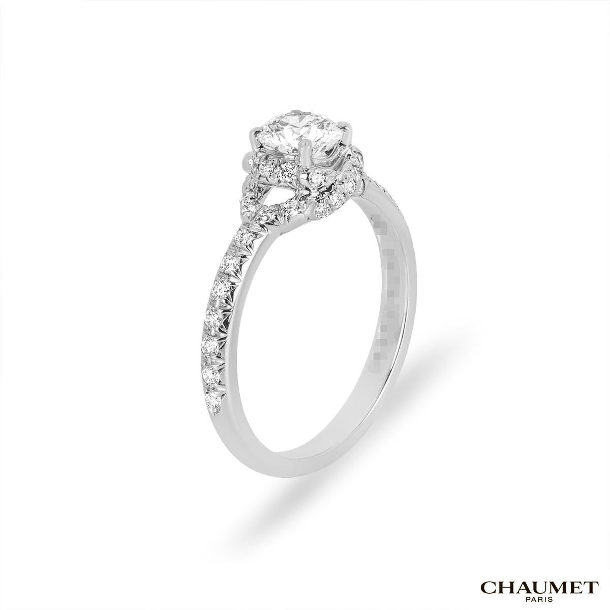A stunning platinum Chaumet ring from the Liens D'Amour collection. The ring is set to the centre with a round brilliant cut diamond weighing 0.51ct, G colour and VVS2 clarity. The diamond scores an excellent rating in all three aspects for cut,