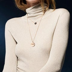 Chaumet Pendentif en or rose et onyx
