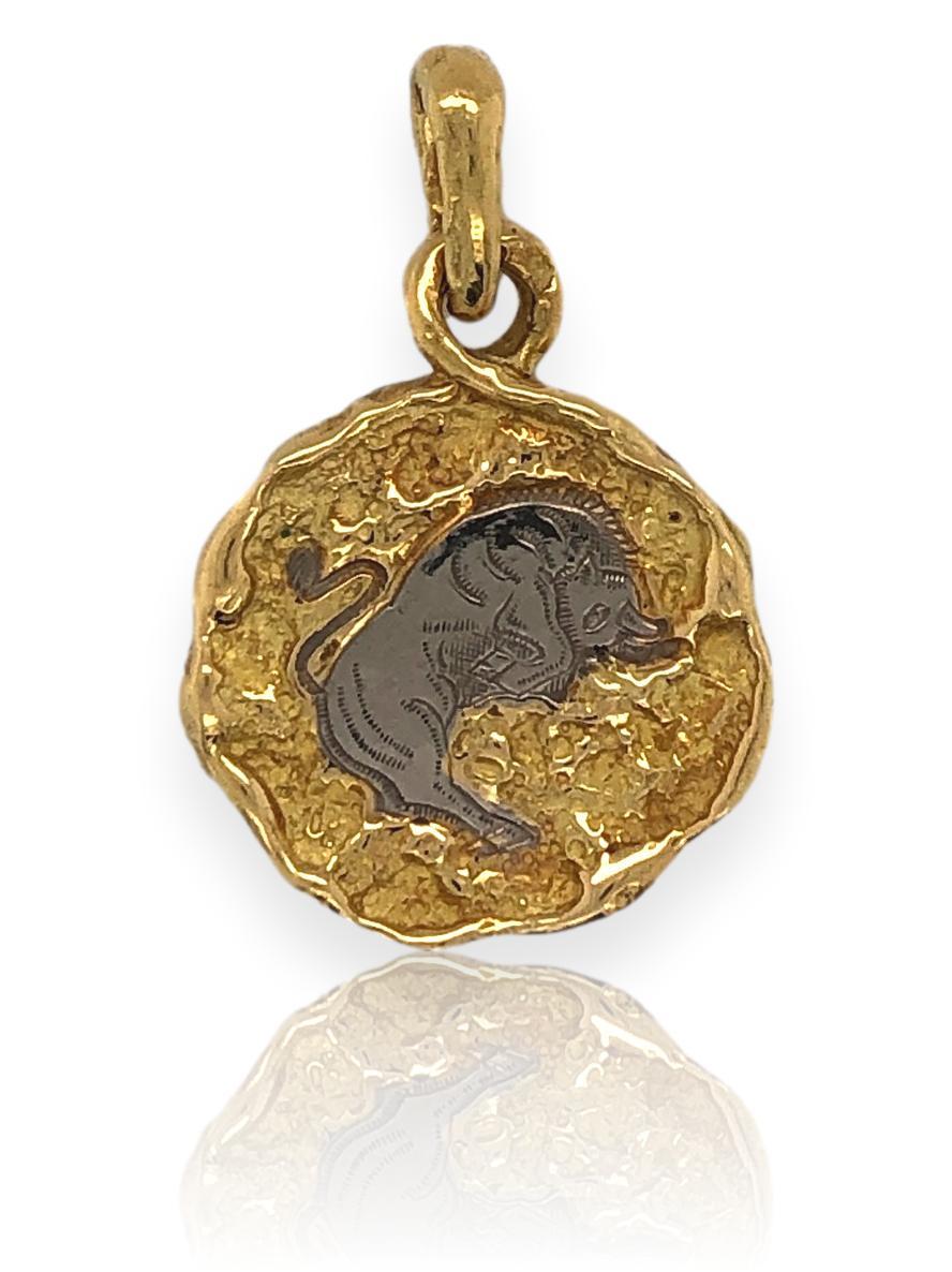 Taurus two-tone gold zodiac pendant By Chaumet, Paris. The 3/4