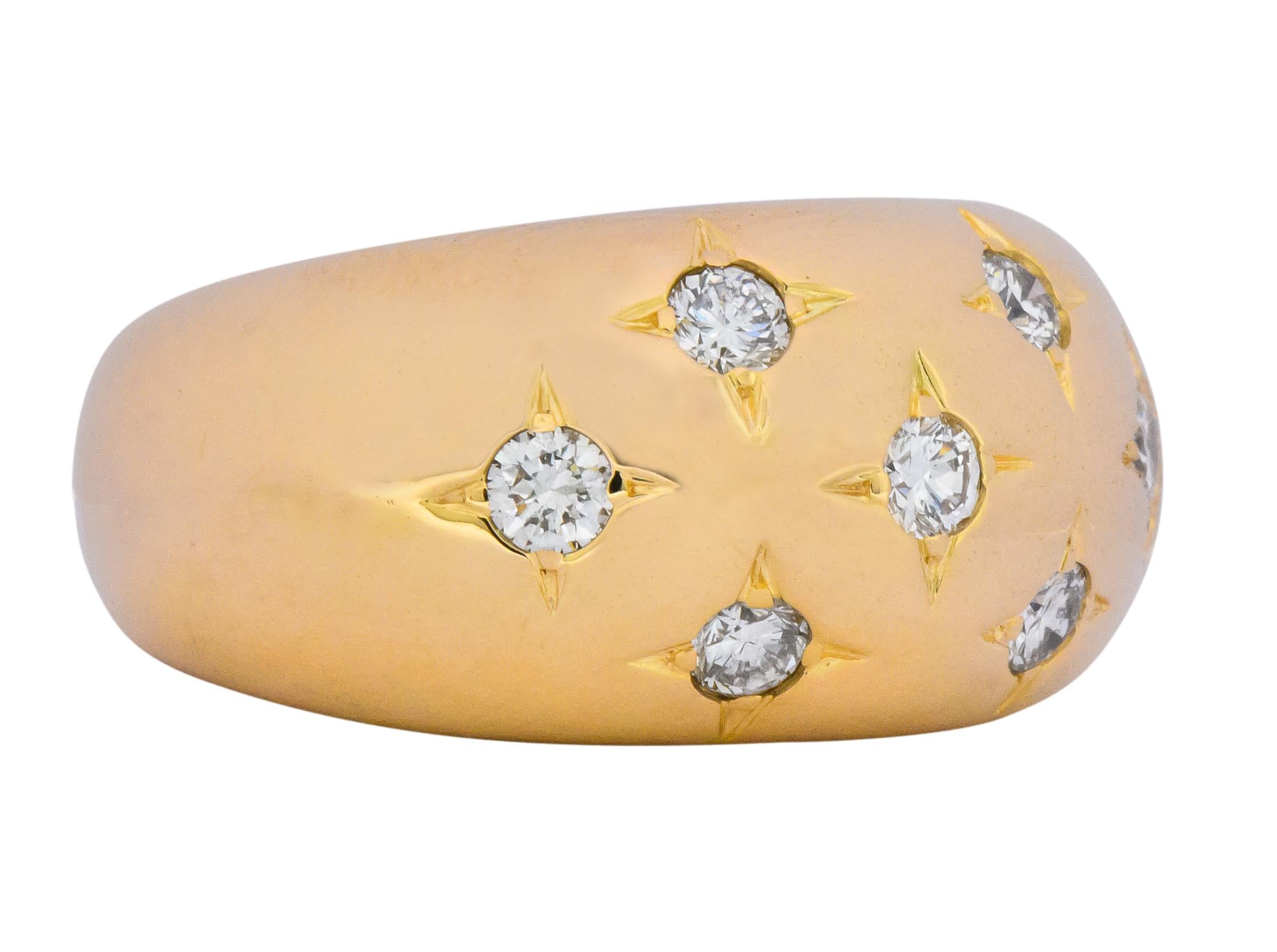 High polished gold, bombay style ring

With seven graver set round brilliant cut diamonds weighing approximately 0.45 carat, H/I color and VS clarity

Numbered and fully signed Chaumet Paris

Stamped with marker's mark and 750 for 18 karat