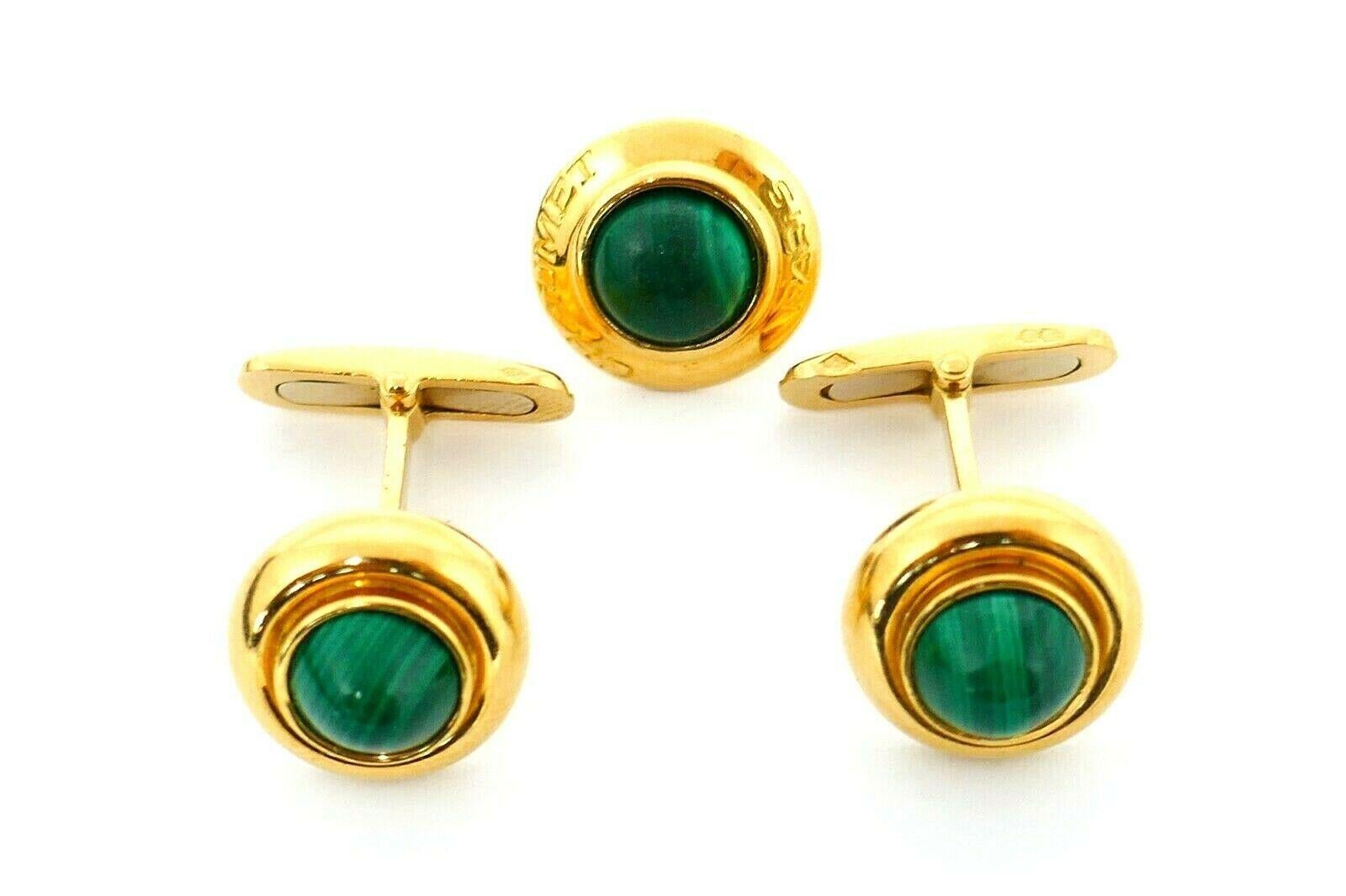 A beautiful set of cufflinks and a tie tack from Chaumet (Paris). Made of 18k yellow gold and malachite. Stamped with the Chaumet maker's mark, a hallmark for 18k gold and a serial number. The tie tack has a Chaumet Paris engraving on the front