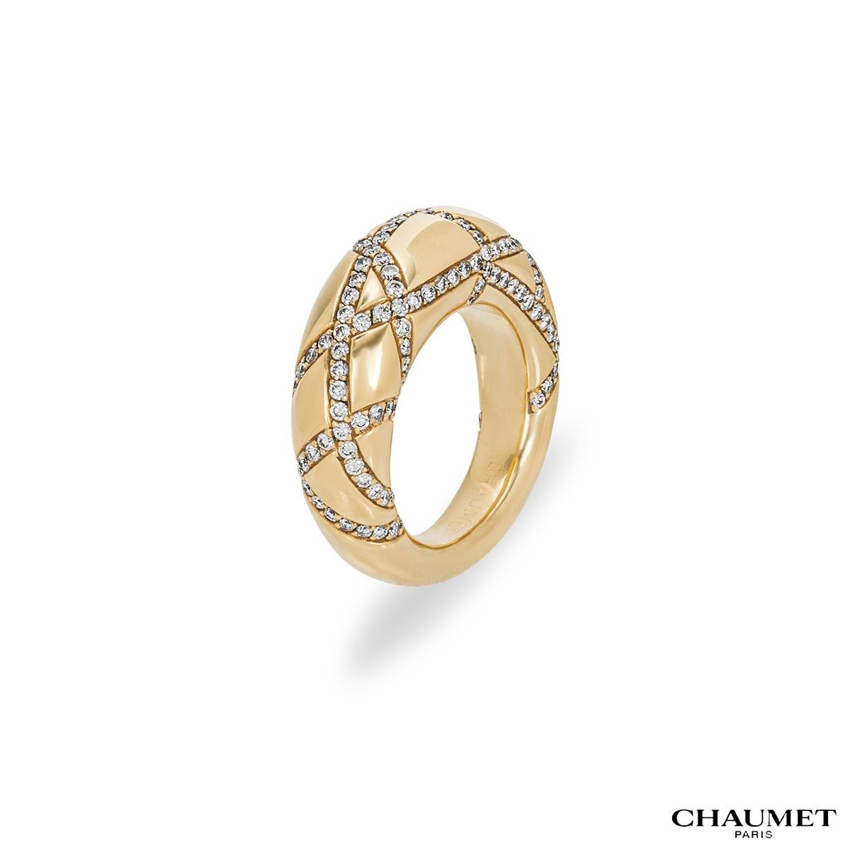 An 18k yellow gold diamond dress ring by Chaumet. The ring features a round brilliant cut diamond set crossover pattern. The diamonds have a total weight of approximately 1.20ct, G+ colour and VS+ clarity. The ring measures 9mm in width, is a UK N /