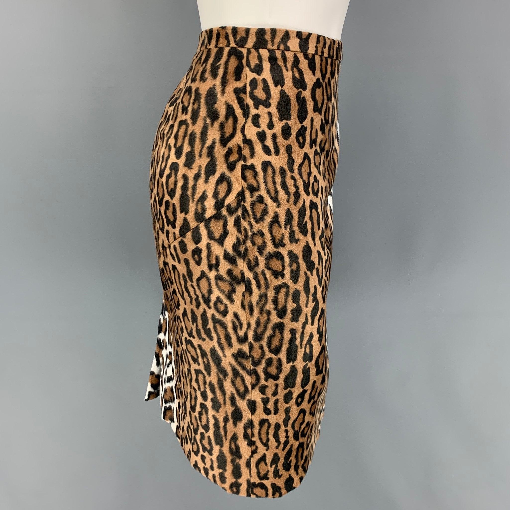 CHEAP and CHIC by MOSCHINO skirt comes in a beige & brown animal print acetate / rayon featuring a pencil style, back slit, and a side zipper closure. Made in Italy.
Very Good
Pre-Owned Condition. 

Marked:   I 44 / D 40 / F 40 / GB 12 / USA 10 