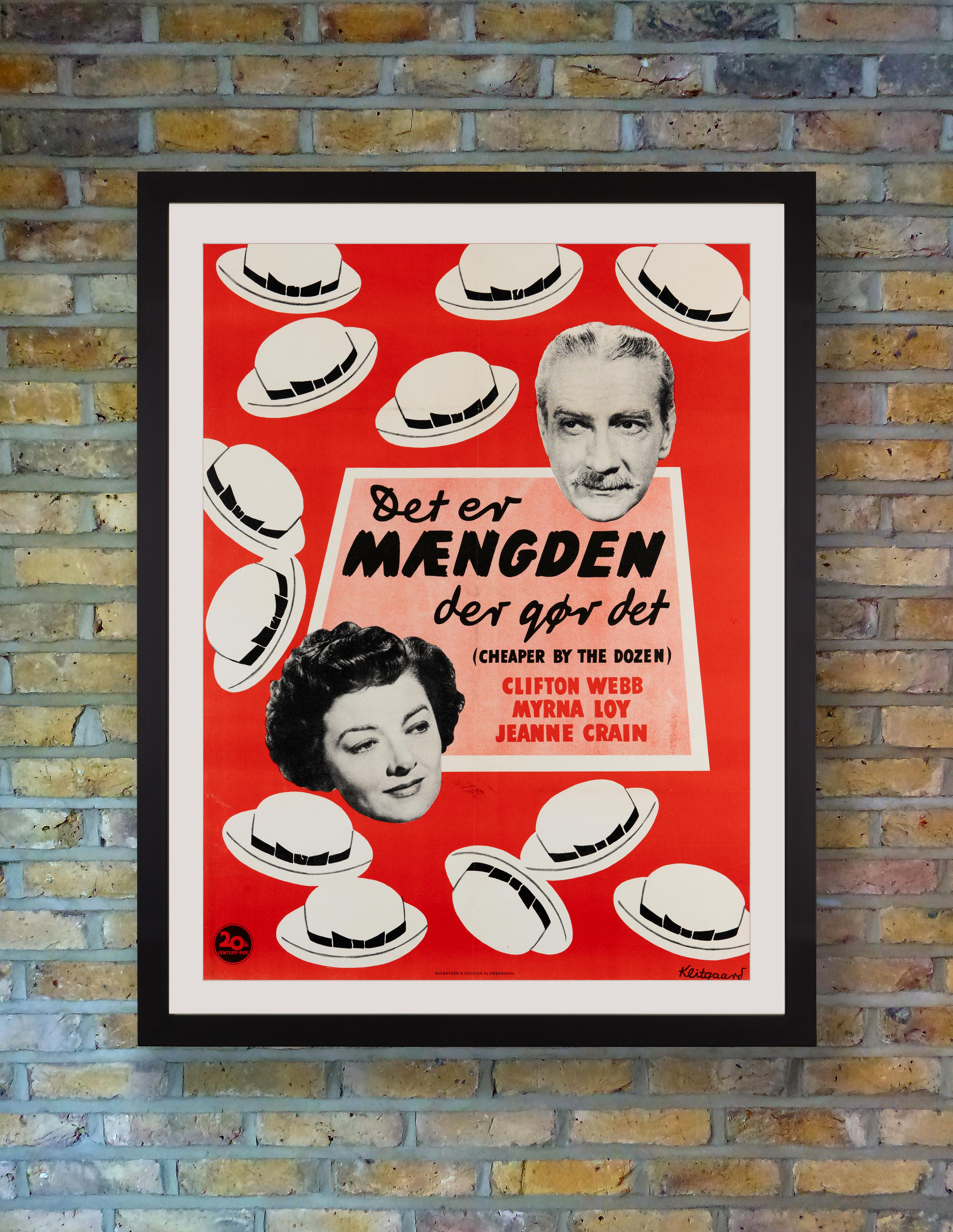 With it's twelve jolly little hats, this charming poster by Klitgaard advertised the first Danish release of the fun-filled 1950 family comedy 'Cheaper by the Dozen,' starring Clifton Webb and Myrna Loy. Based on the autobiographical book of the