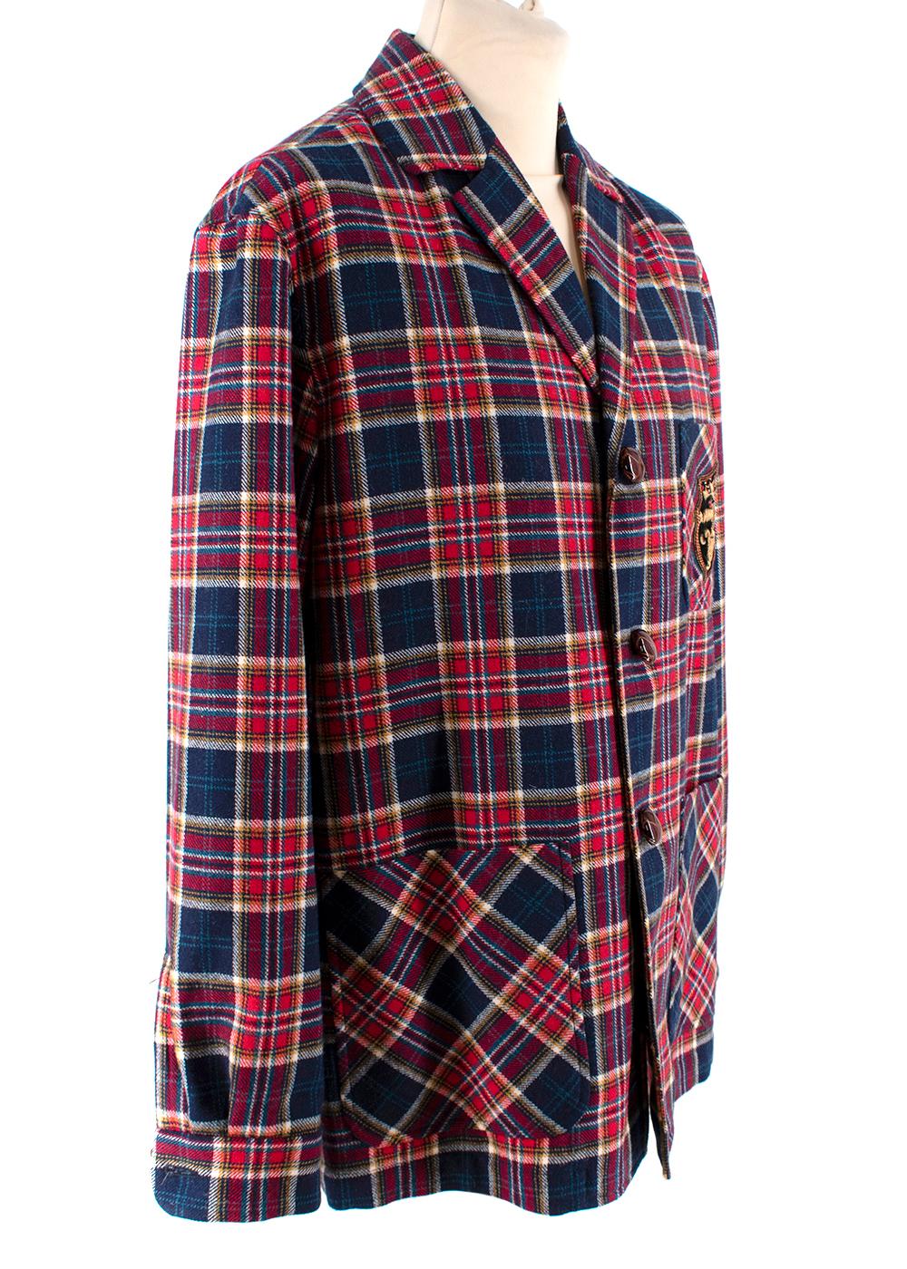Gucci Navy & Red Wool Tartan Single Breasted Blazer

- Lightly tailored single-breasted jacket
- Peak lapel
- Patch hip and breast pockets
- House creast on the chest

Materials 
90% Wool
10% Polyamide
Trimming
57% Viscose 
30% Brass 
5% Silk
5%