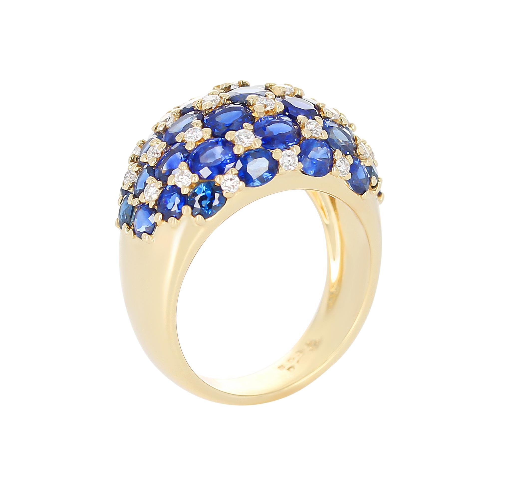 A checker-board Sapphire and Diamond Ring, with 4.82 carats of Sapphires, and 0.38 carats of Diamonds. The total weight is 8.78 grams, 18 Karat Yellow Gold, Ring Size US 6.50.