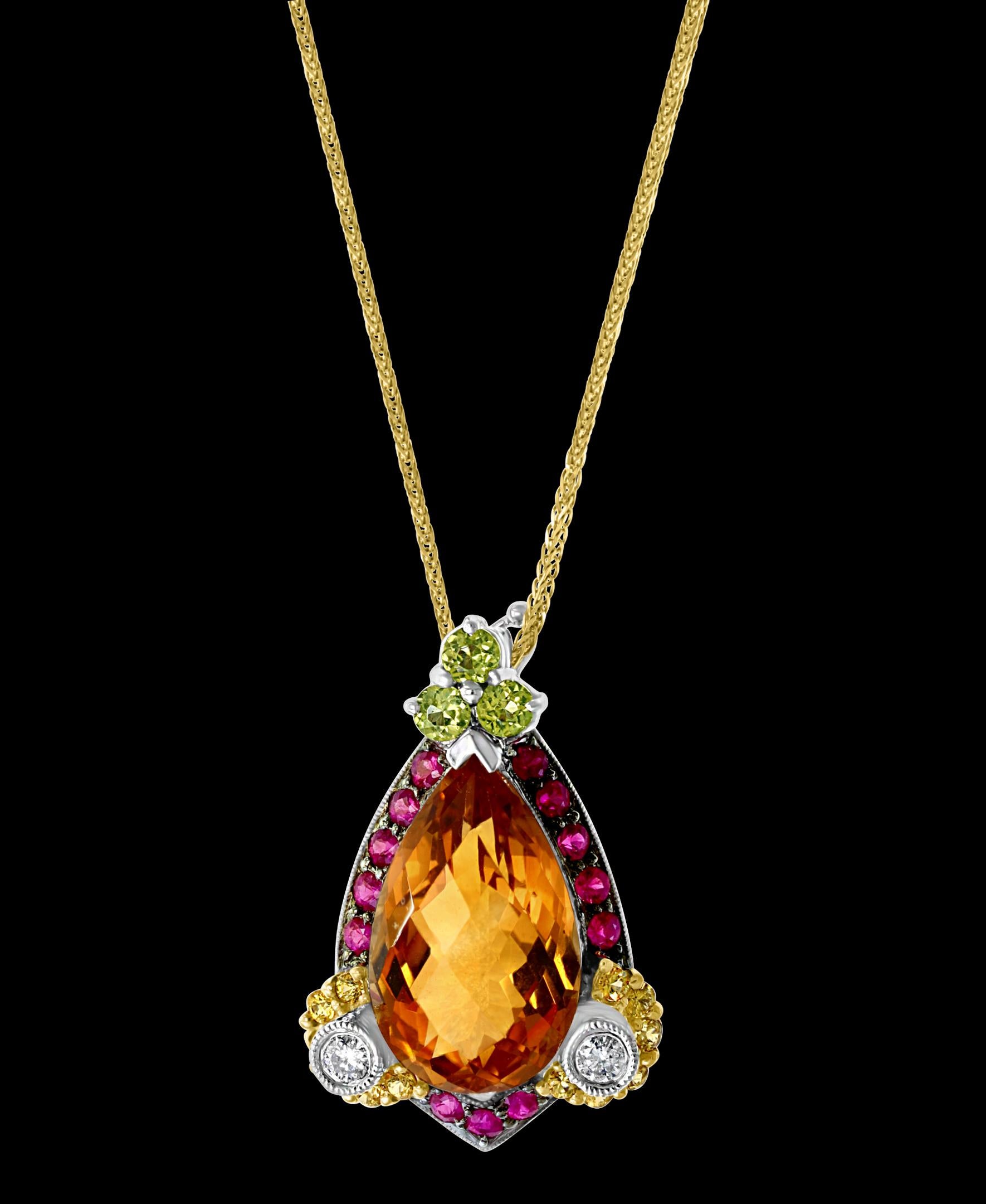 Checkerboard  Citrine Ruby Diamond  Pendent/Necklace 14 Karat  Yellow Gold With Chain
This Citrin Drop Pendant necklace is a eye-catching pendant necklace . It features a large  fine approximately 9 ct  Pear shape Citrine which has checkerboard