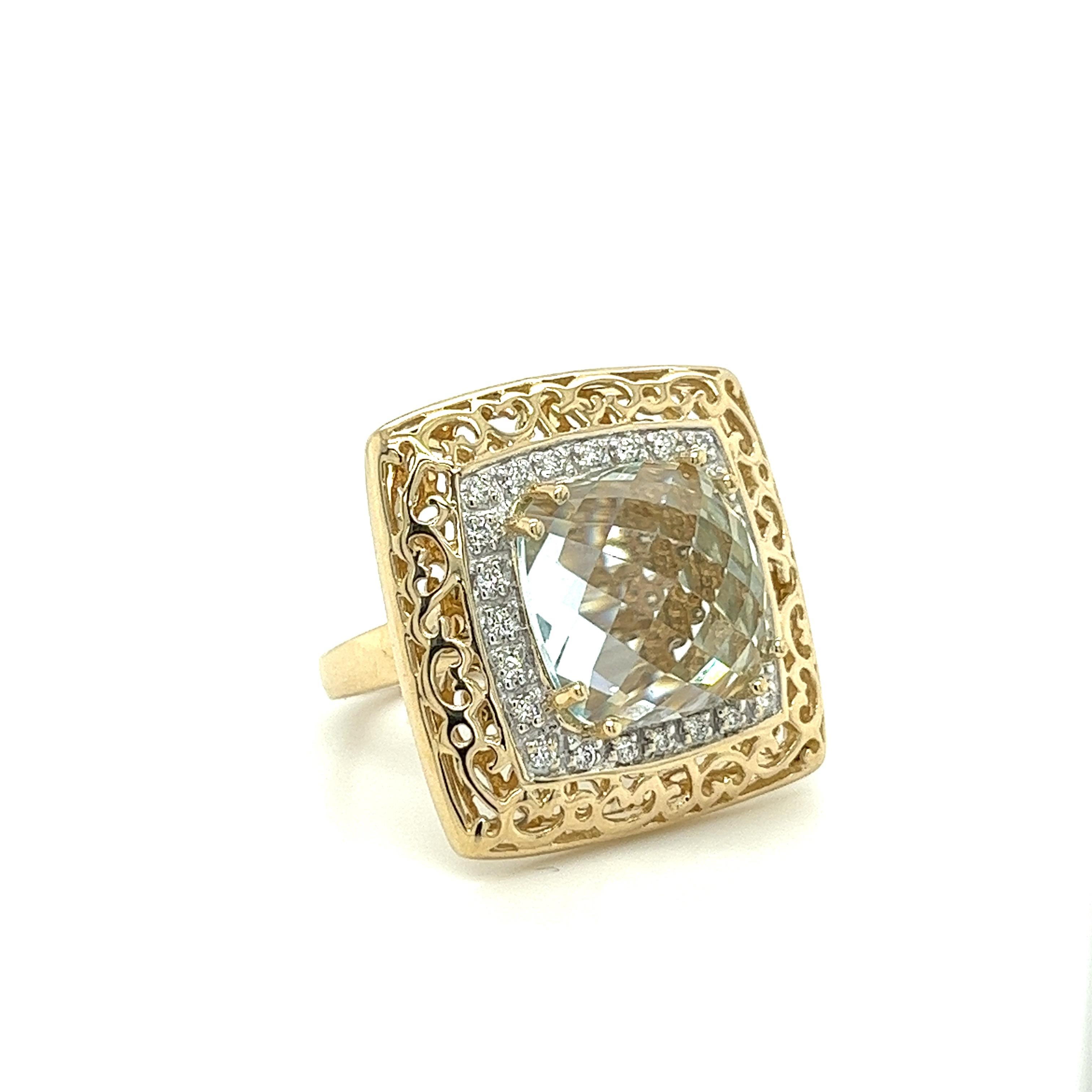 Welcoming this elegant multi stone cocktail ring; sparkling with a Sky Blue Topaz and diamond side-stones. Set in a 14K yellow gold, this ring is sure to turn heads with its gorgeous detailing. The main stone is checkerboard cut, adding depth and