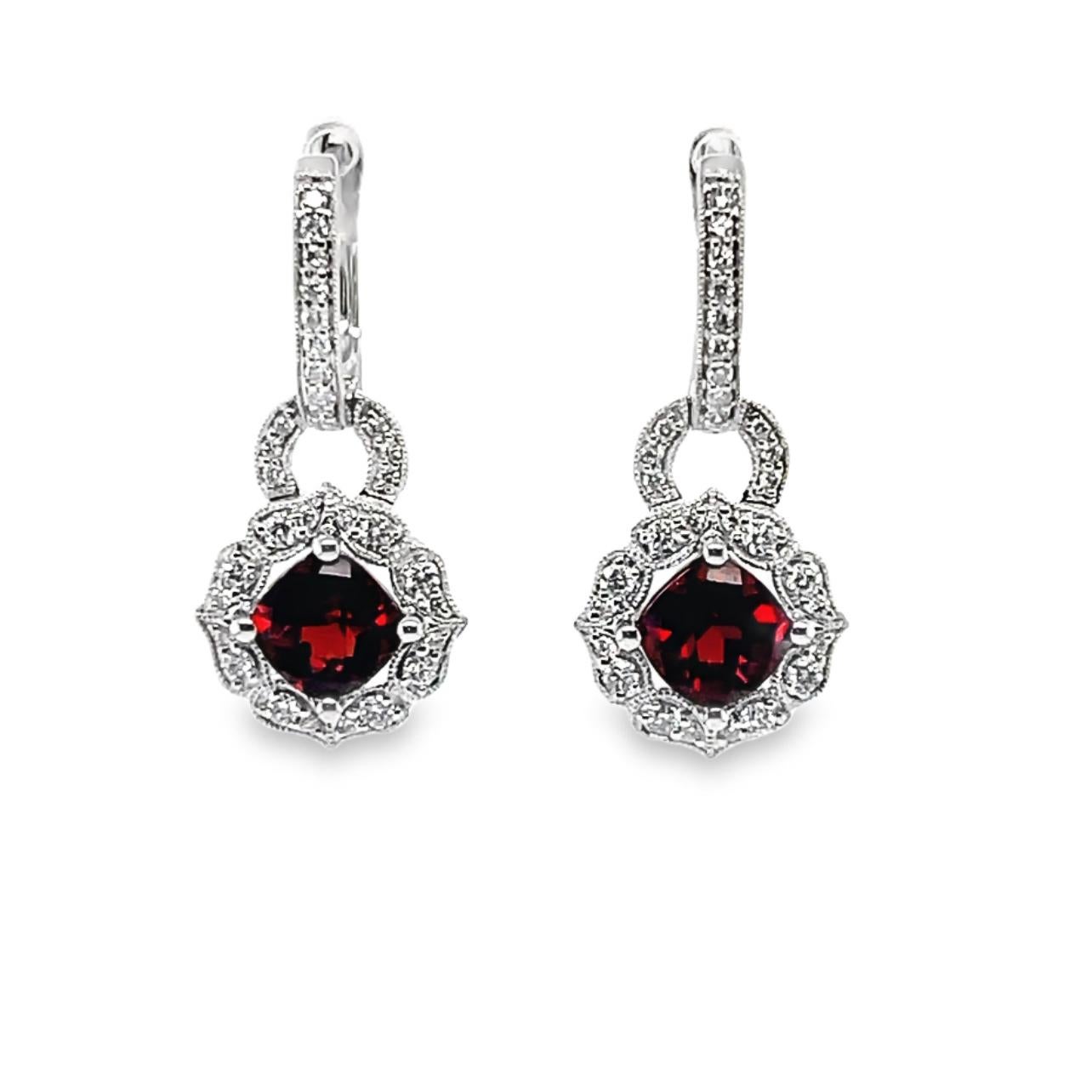 These stunning hoop earrings have top quality cushion checkerboard Garnet center surrounded by sparkling brilliant cut diamonds. These earrings come in a beautiful black box for the perfect gift. They have detailed tags and are brand new. 

14KW