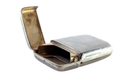 Checkered nickel silver case with monogram plate, insert, spring-hinged lid