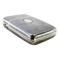 Checkered nickel silver case with monogram plate, insert, spring-hinged lid