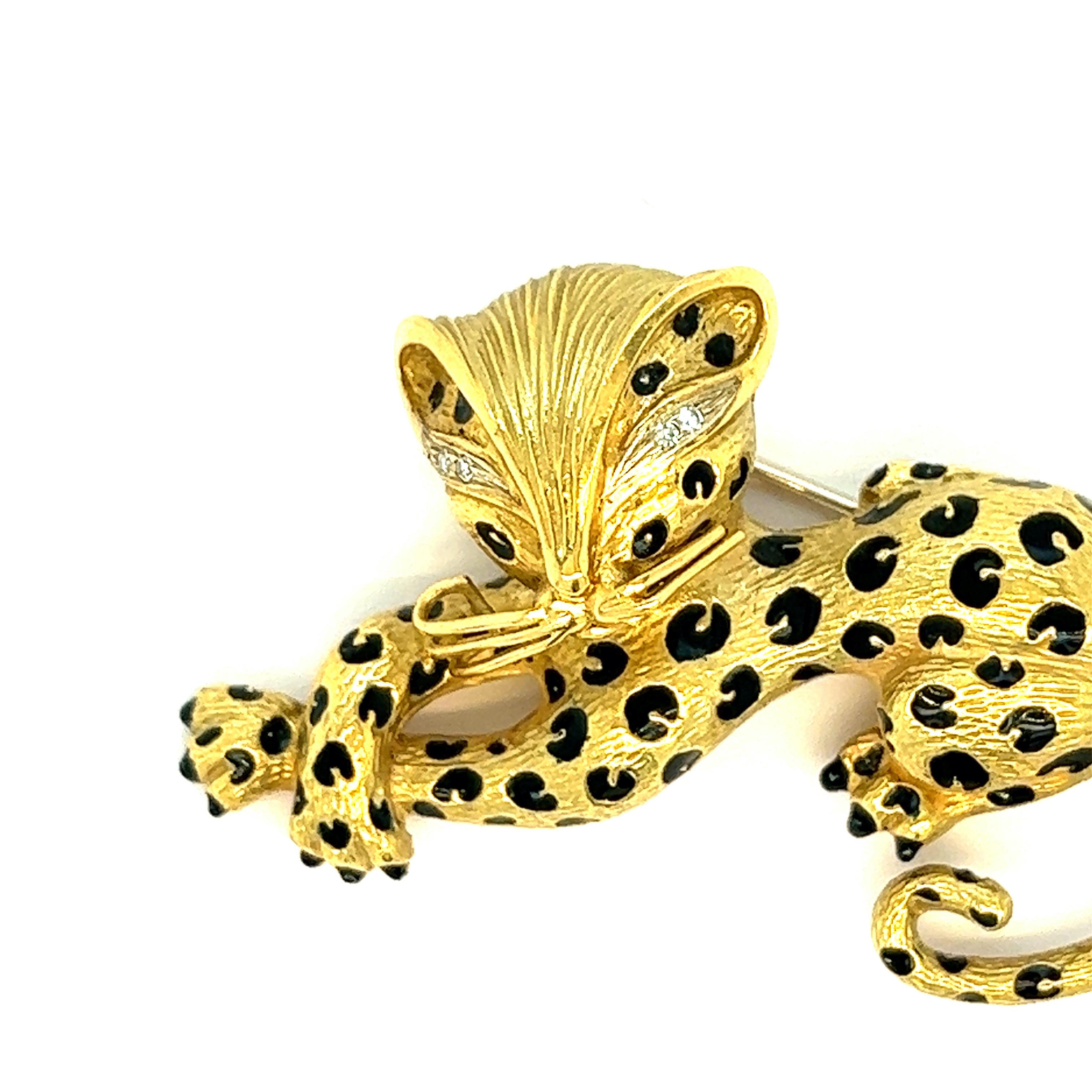 Cheetah black enamel gold brooch

Cheetah motif with black enamel spots, eyes are made out of small round-cut diamonds, 18 karat yellow gold; marked 18KT, HB, 4341

Size: width 2.25 inches, length 1.5 inches
Total weight: 30.4 grams 