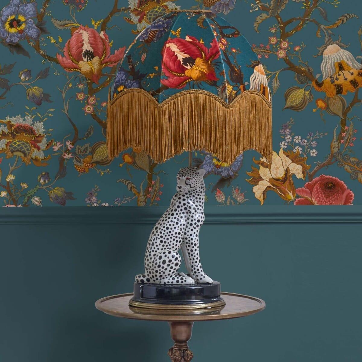 Bring the beauty of the animal kingdom into your home with this exquisite cheetah-shaped lamp-stand. Crafted from hand painted porcelain with a brass frame at the base, this love forever stand looks doubly stylish when paired with one of our printed
