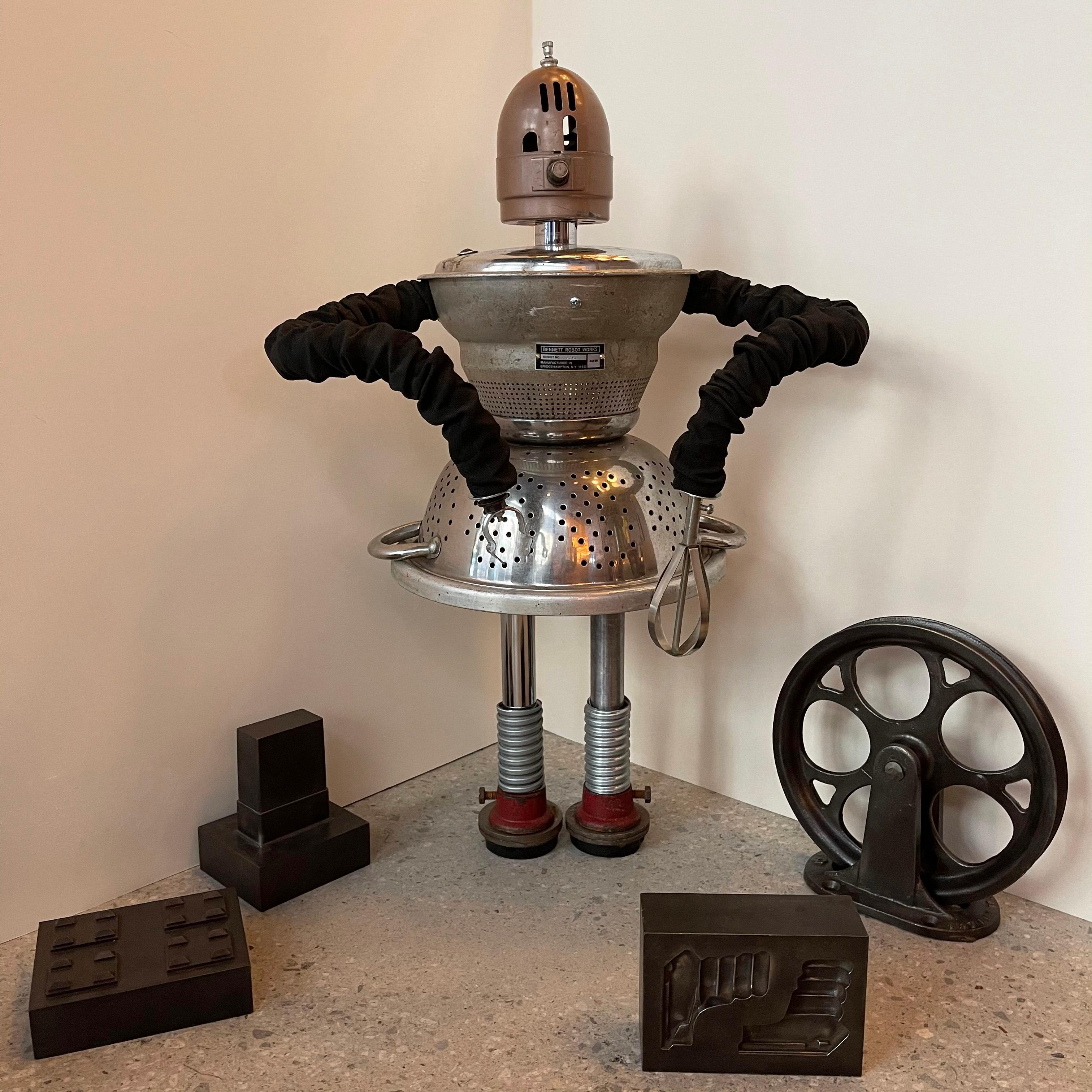 Custom robot sculpture named Chef by Bennett Robot Works, Brooklyn, NY

Bennett Robot Works, robot sculptures created by Gordon Bennett, are composed of found, vintage objects used in their unaltered entirety. They are inspired by Norman Bel